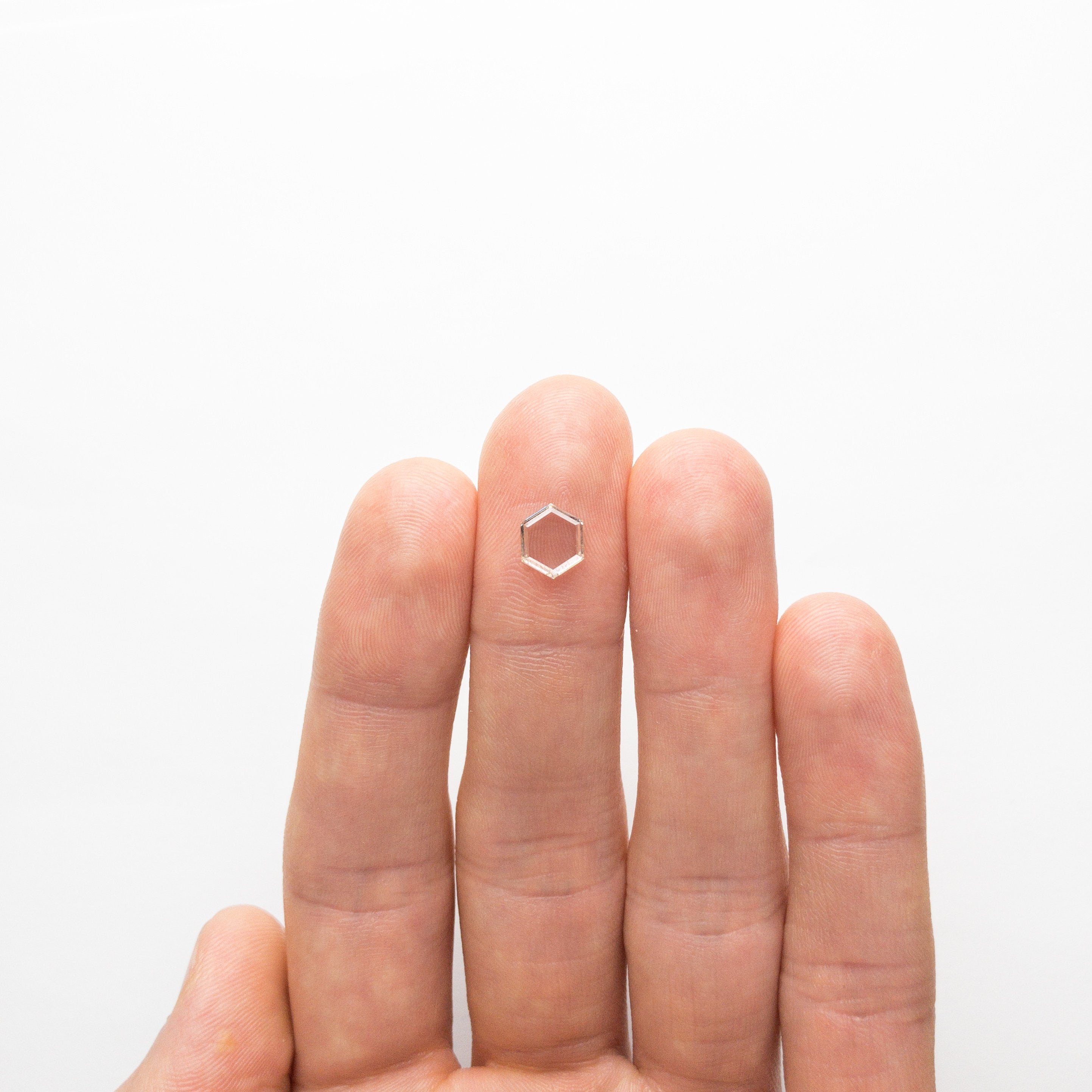 1.06ct 8.09x6.71x1.74mm VS O-P Hexagon Portrait 18878-05