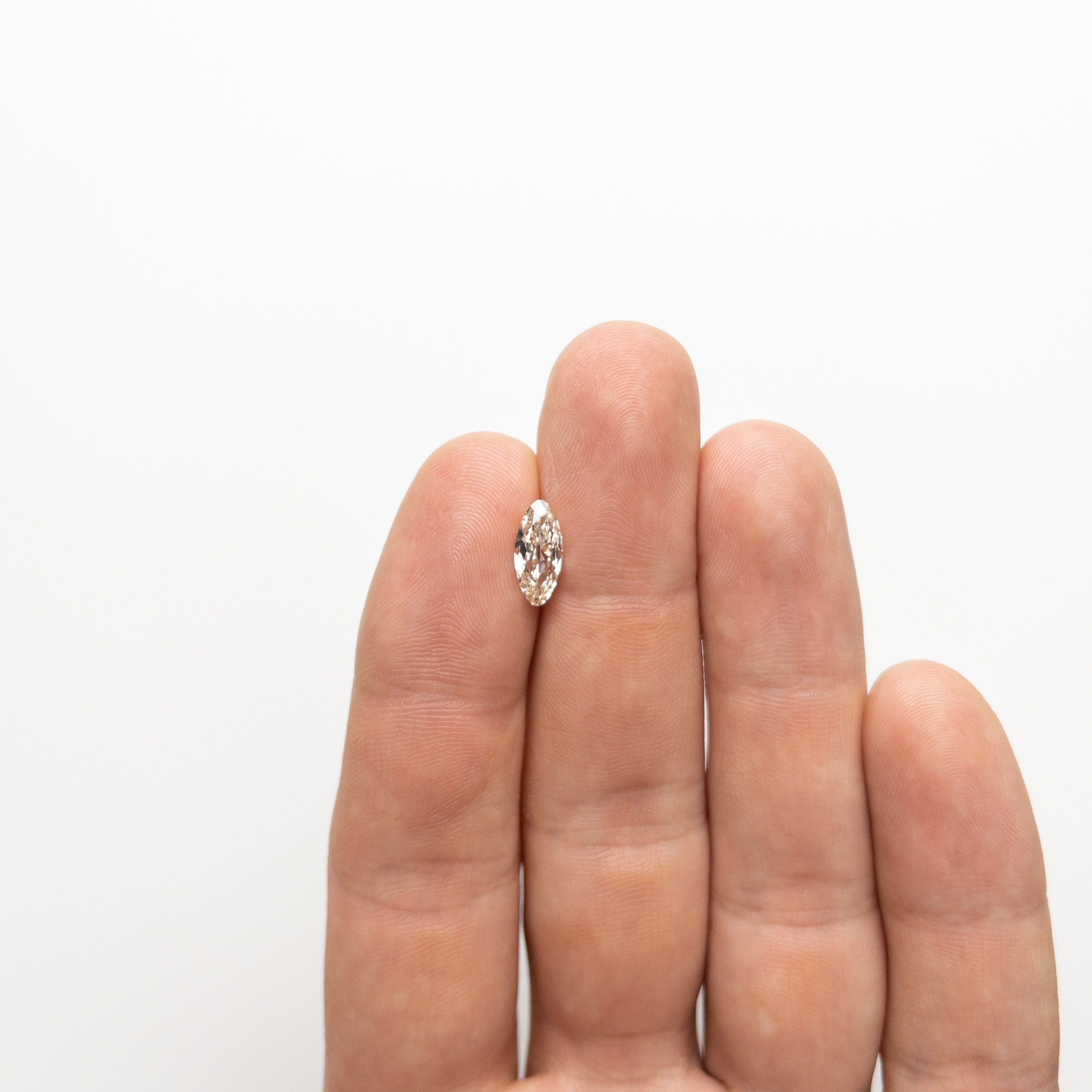 1.02ct 11.07x5.08x2.54mm VVS2 Champagne Modern Antique Moval 18883-01