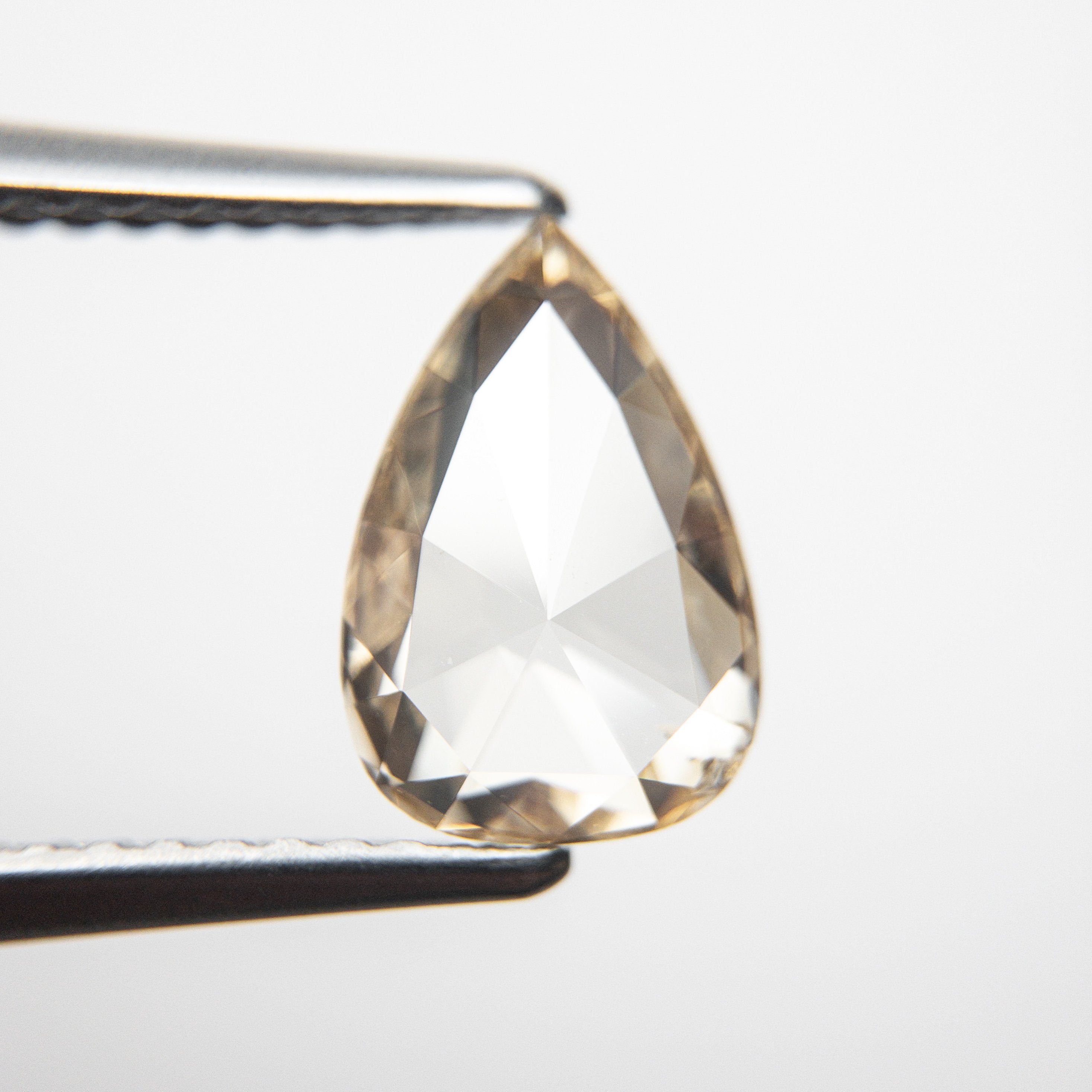 1.32ct 9.77x6.60x2.42mm SI2 Champagne Pear Rosecut 18884-01
