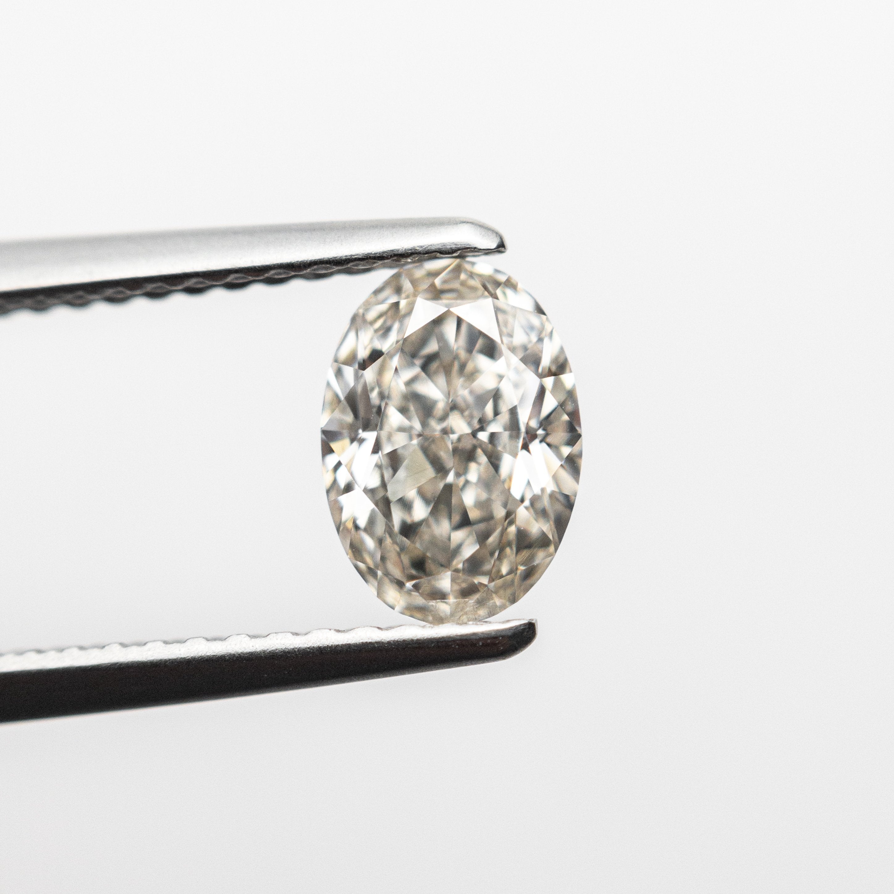 1.04ct 7.51x5.34x3.41mm VS Champagne Oval Brilliant 18890-01