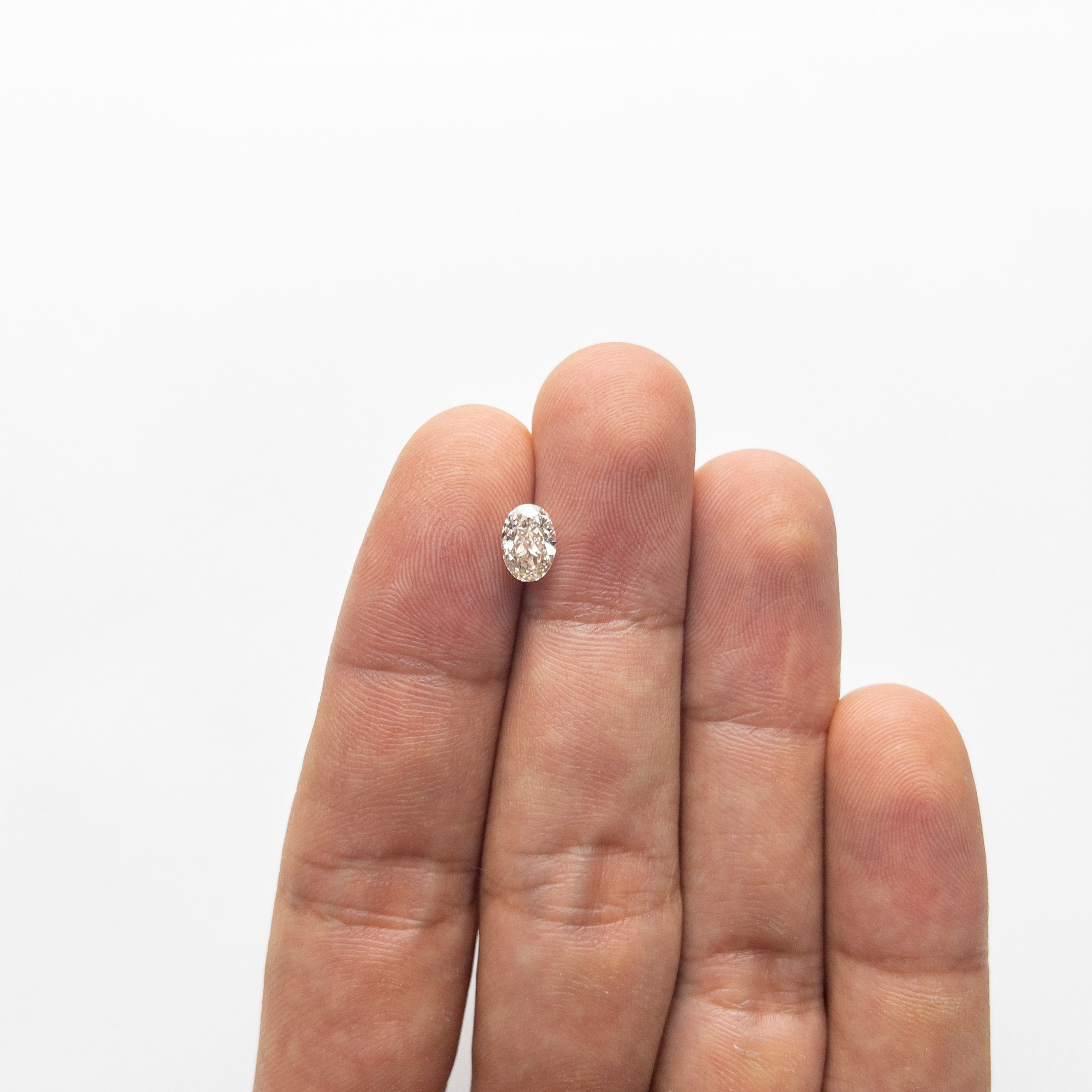 1.04ct 7.51x5.34x3.41mm VS Champagne Oval Brilliant 18890-01