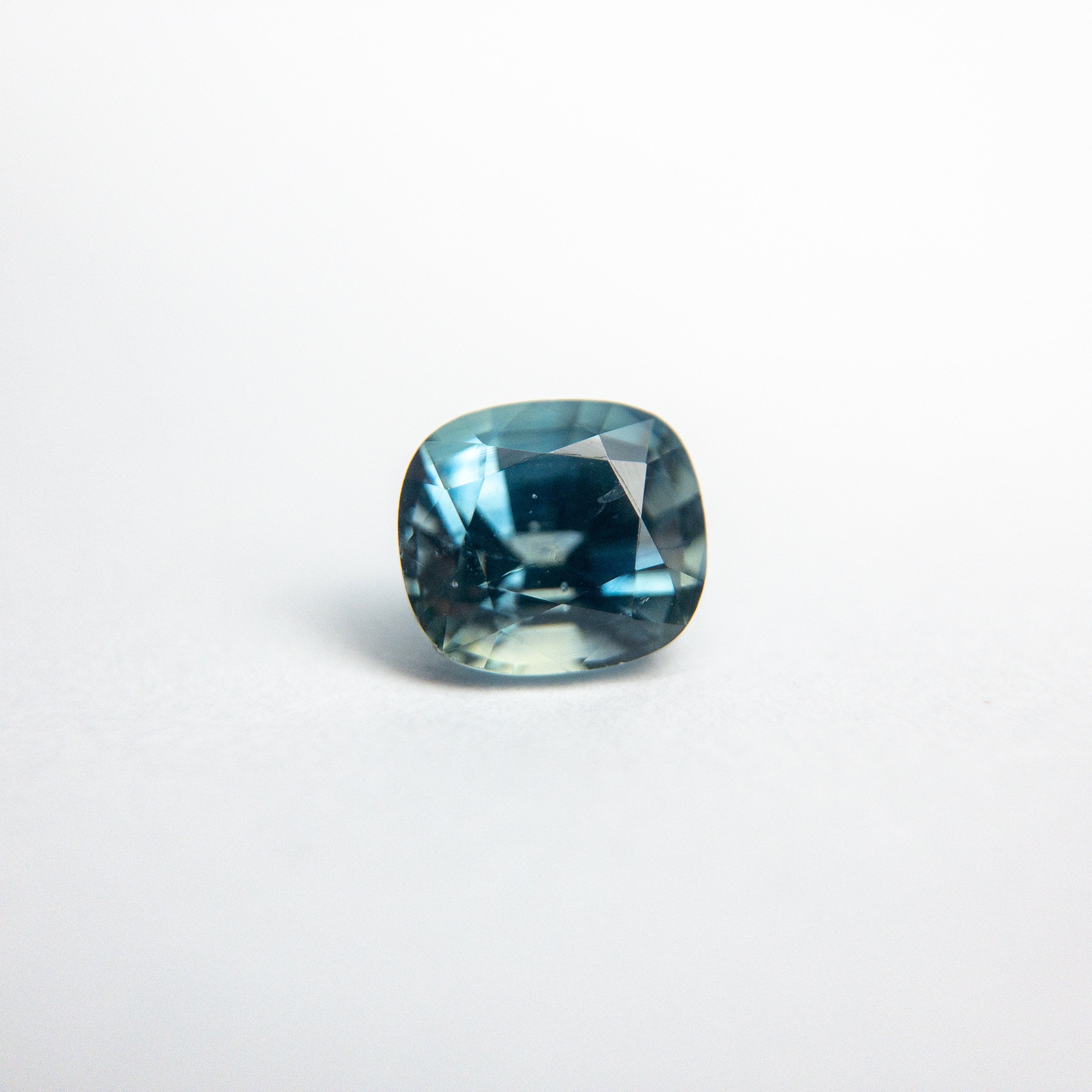 0.64ct 4.93x4.44x3.43mm Cushion Brilliant Sapphire 18973-06