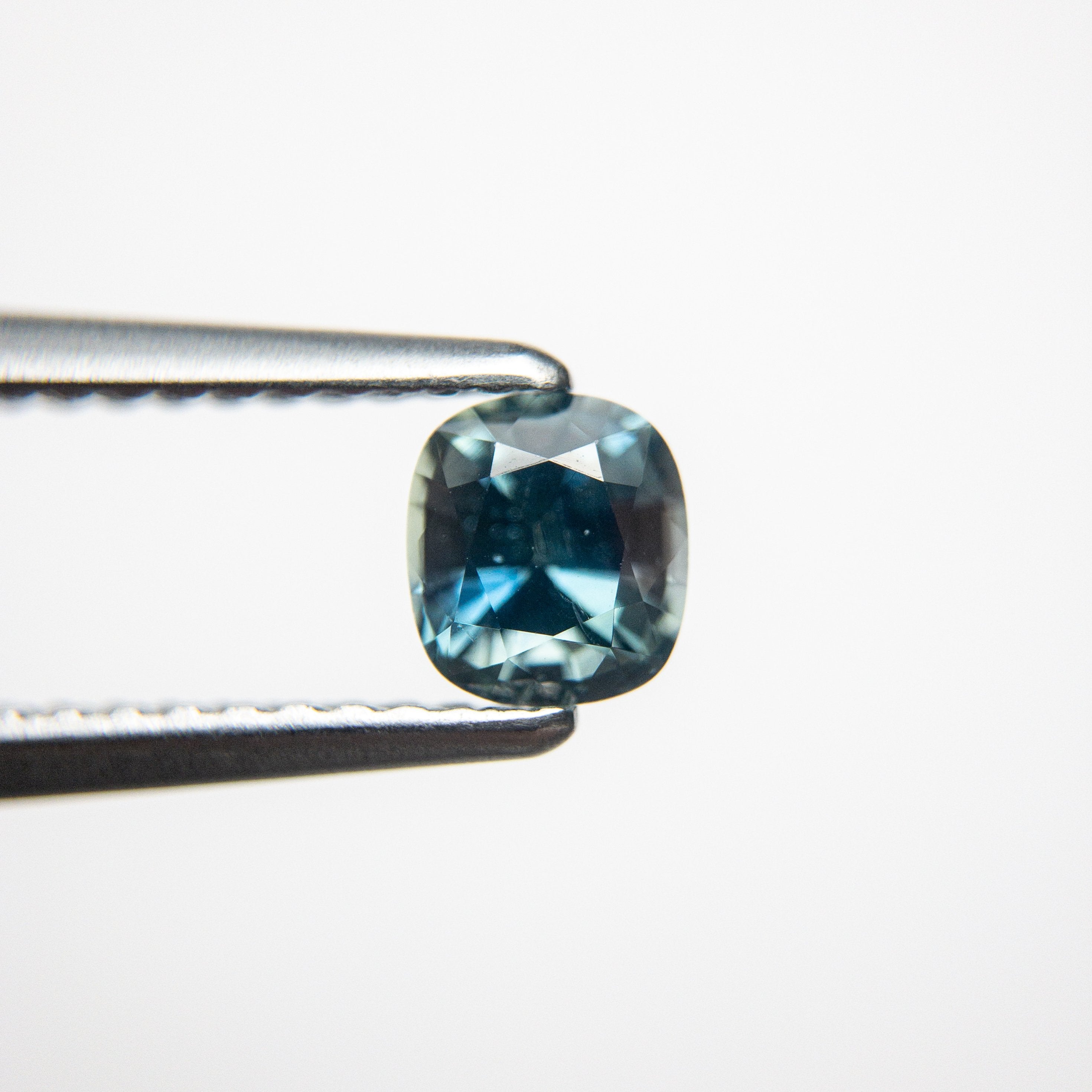 0.64ct 4.93x4.44x3.43mm Cushion Brilliant Sapphire 18973-06