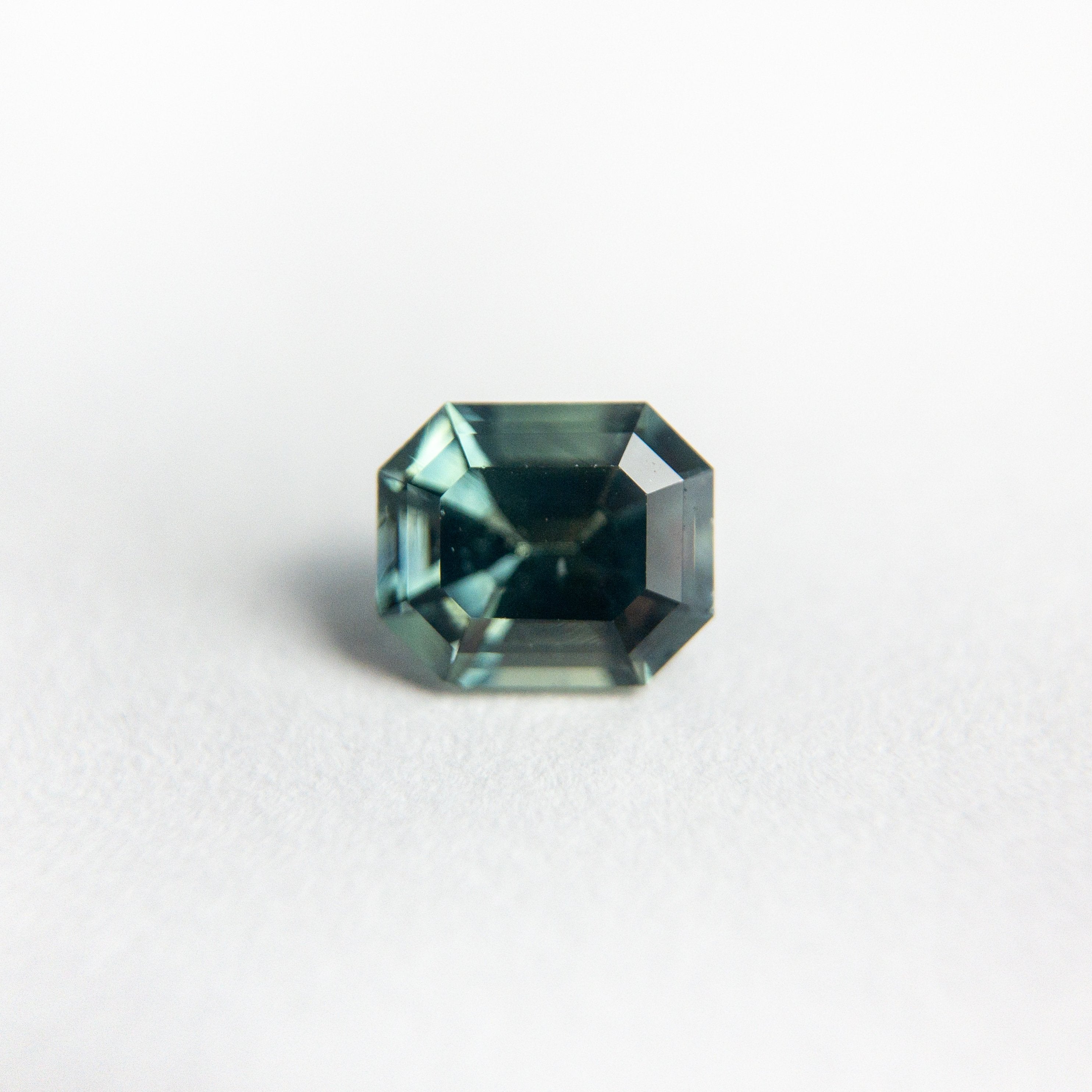 0.69ct 5.39x4.54x3.27mm Cut Corner Rectangle Step Cut Sapphire 18973-28
