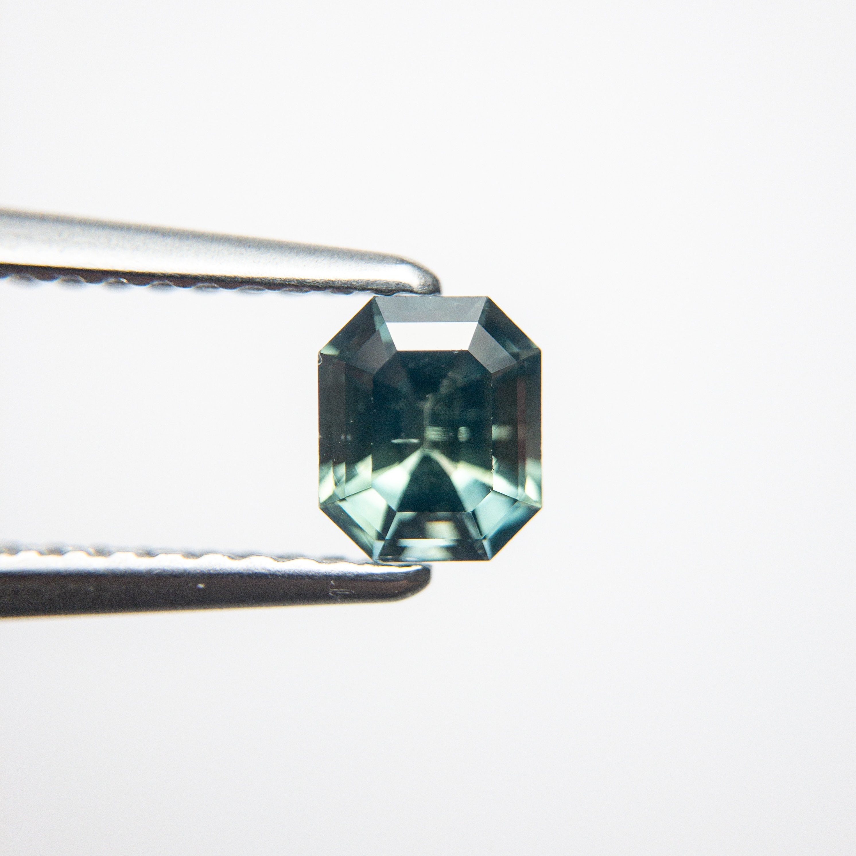 0.69ct 5.39x4.54x3.27mm Cut Corner Rectangle Step Cut Sapphire 18973-28