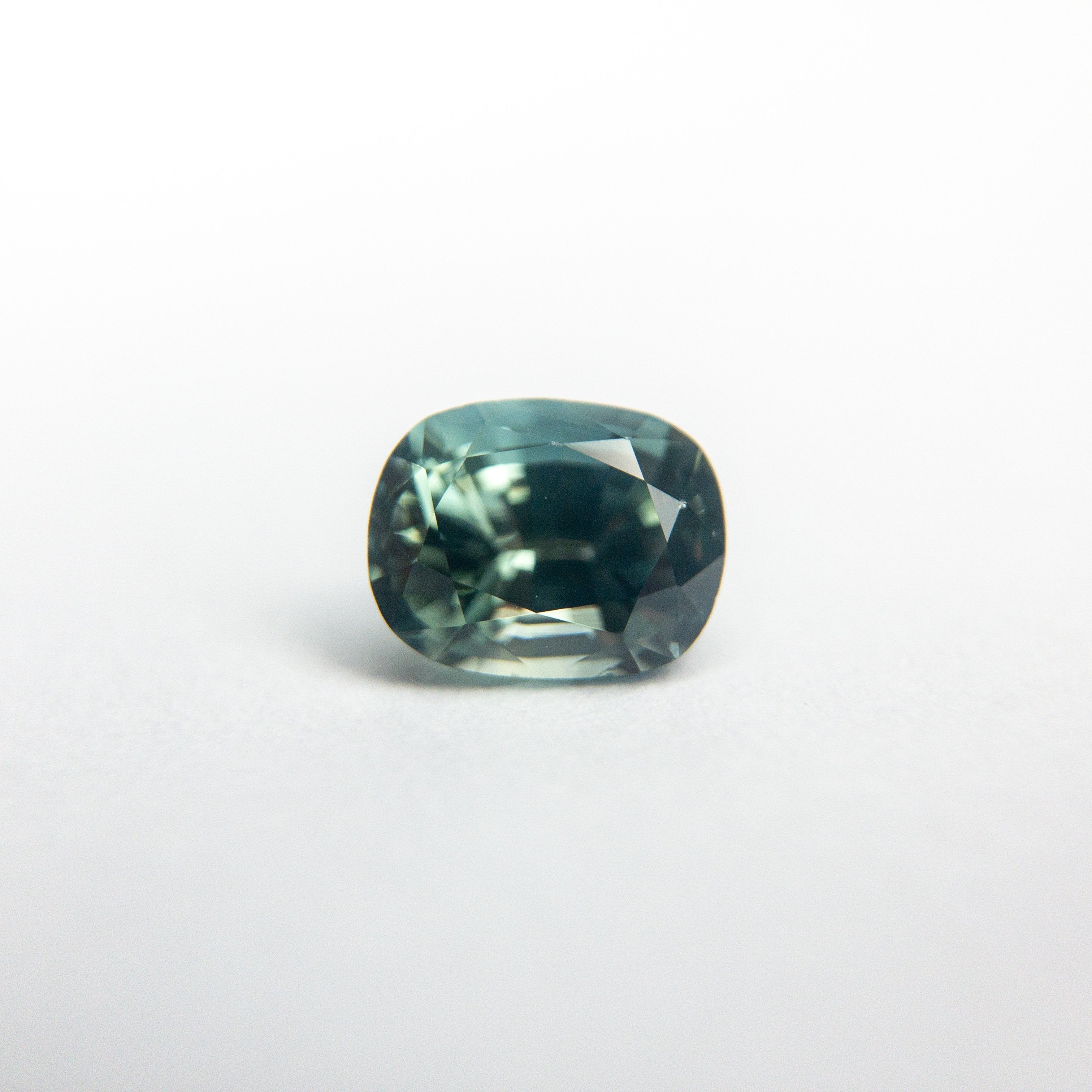 0.79ct 5.72x4.50x3.50mm Cushion Brilliant Sapphire 18973-36
