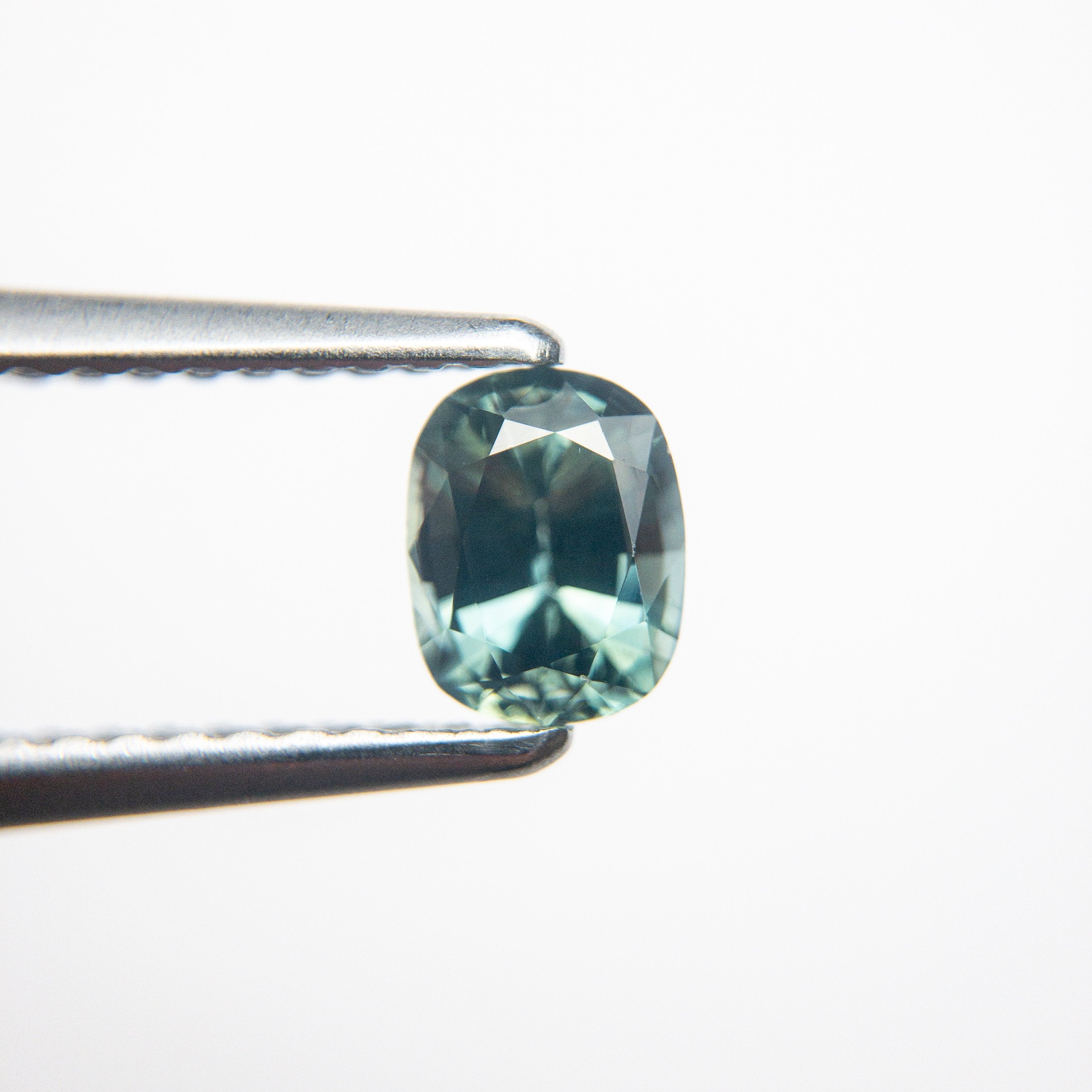 0.79ct 5.72x4.50x3.50mm Cushion Brilliant Sapphire 18973-36