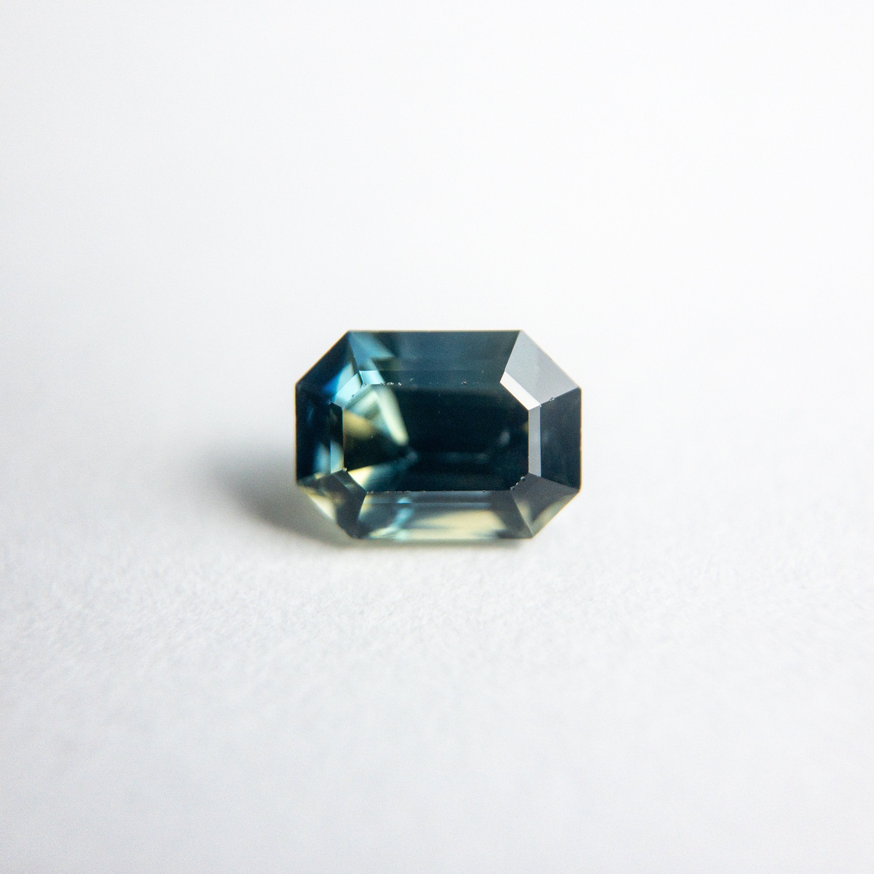 0.66ct 5.51x4.02x3.25mm Cut Corner Rectangle Step Cut Sapphire 18973-63