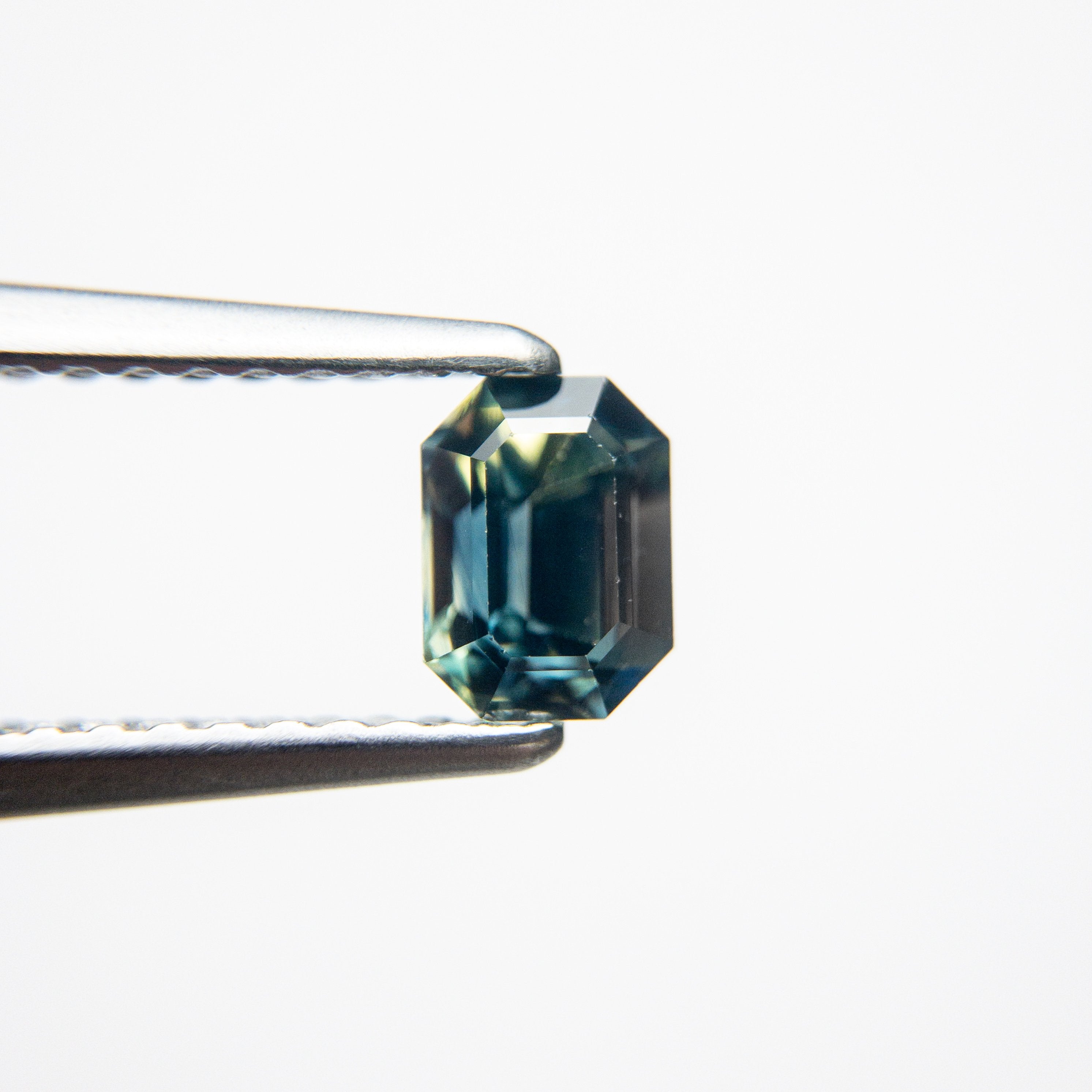 0.66ct 5.51x4.02x3.25mm Cut Corner Rectangle Step Cut Sapphire 18973-63
