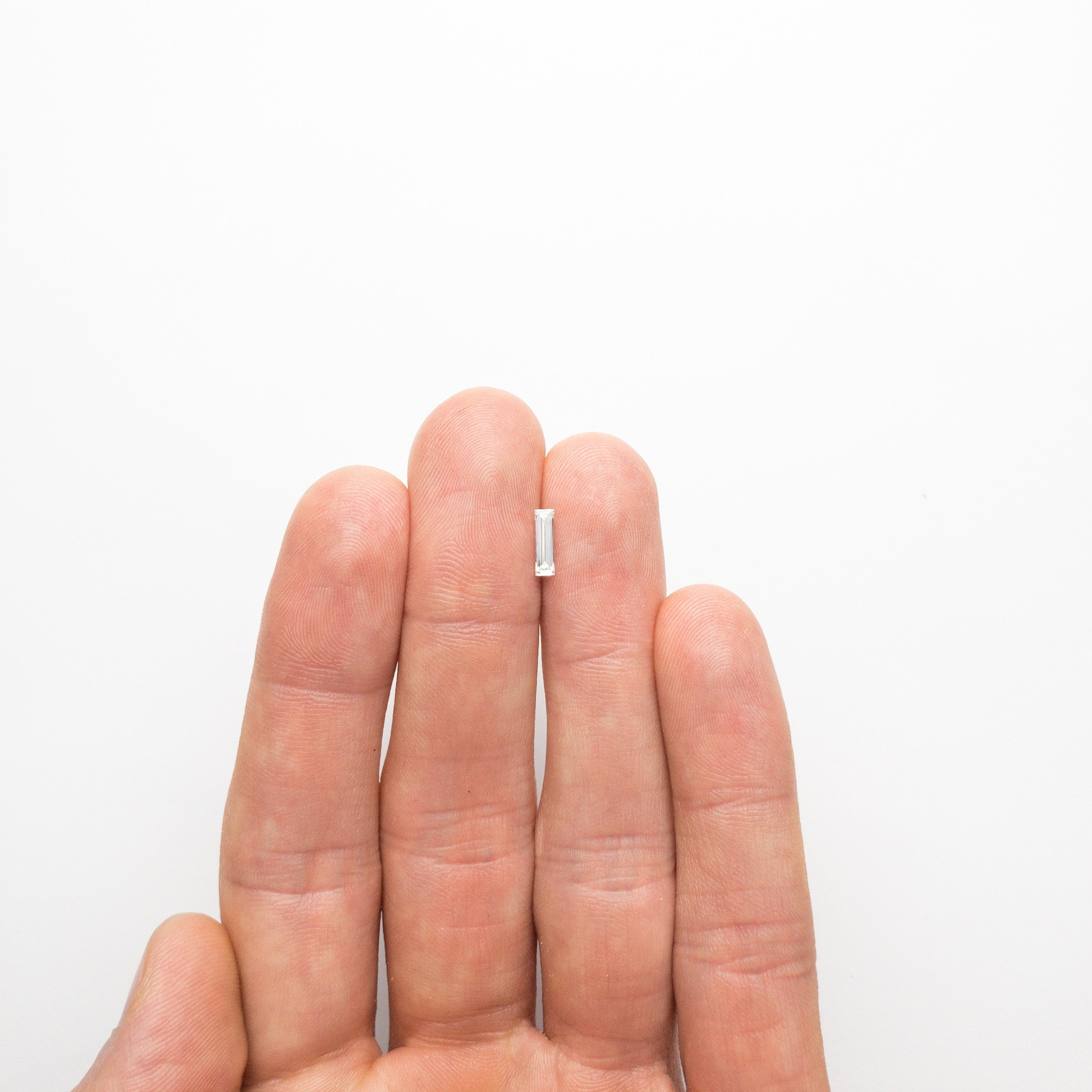 0.28ct 8.04x2.39x1.44mm Baguette Step Cut 19010-04