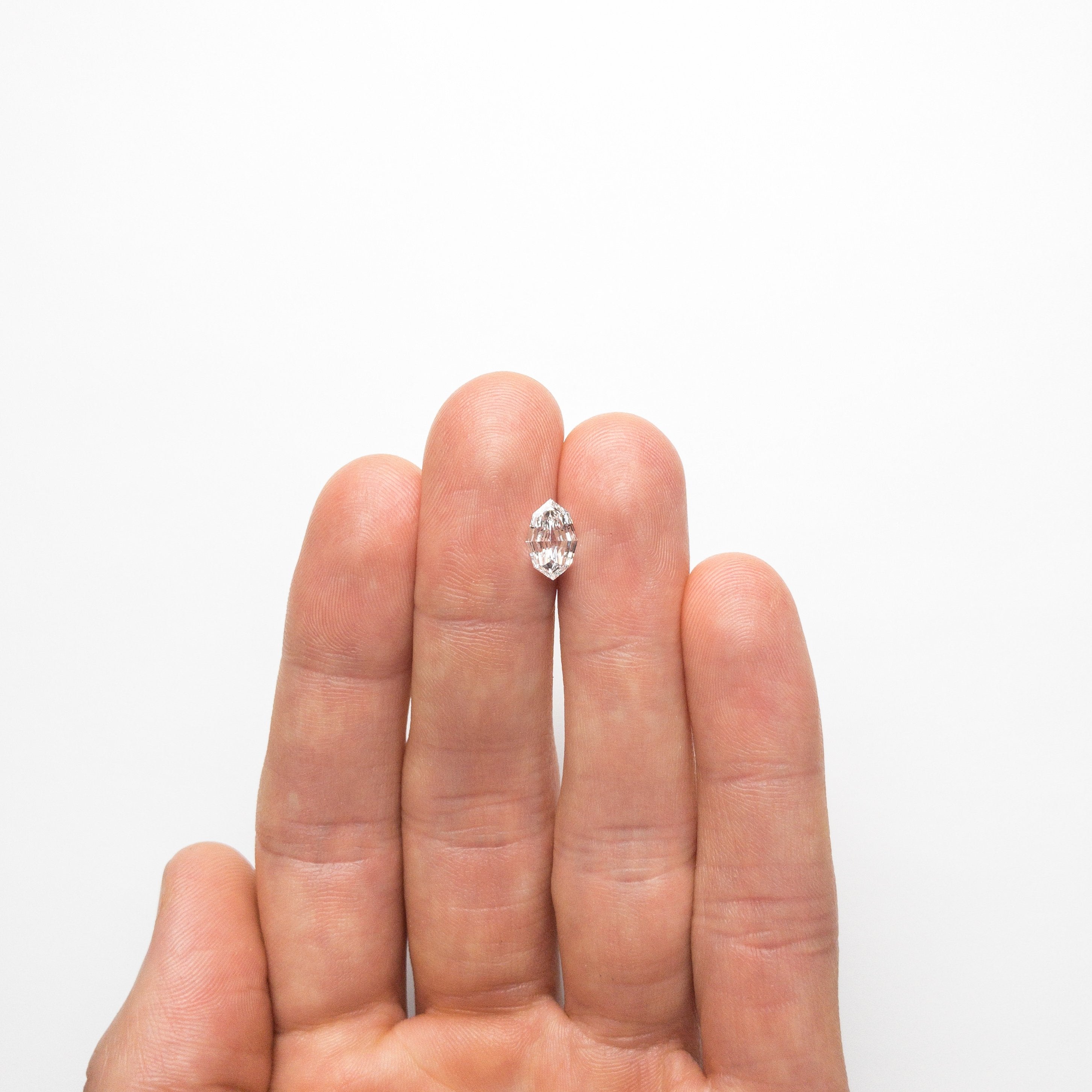 0.94ct 9.64x6.20x2.33mm GIA SI2 D Geo Marquise Step Cut 19021-02