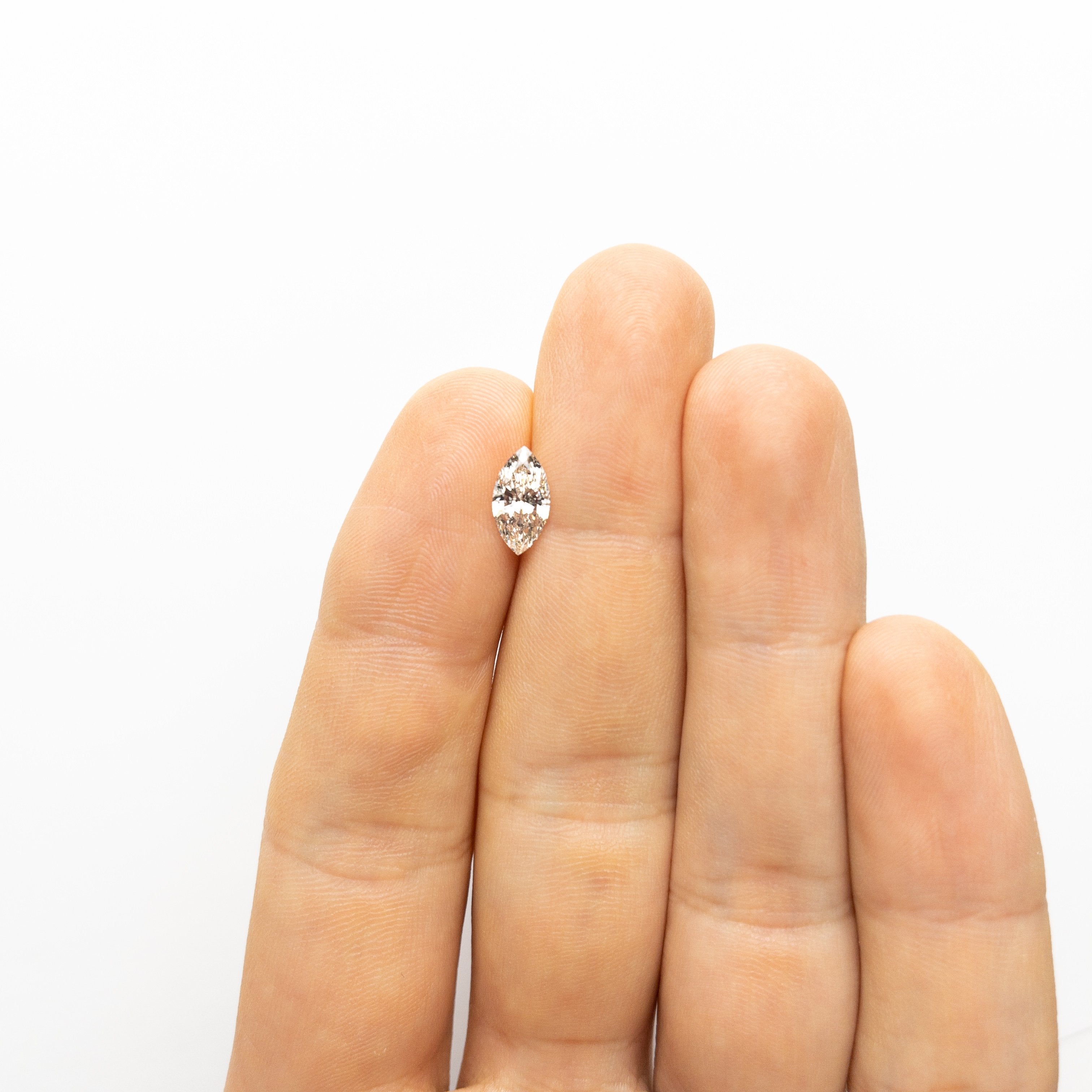 1.02ct 10.34x5.42x3.23mm Champagne Marquise Brilliant 18547-01 Hold D1913