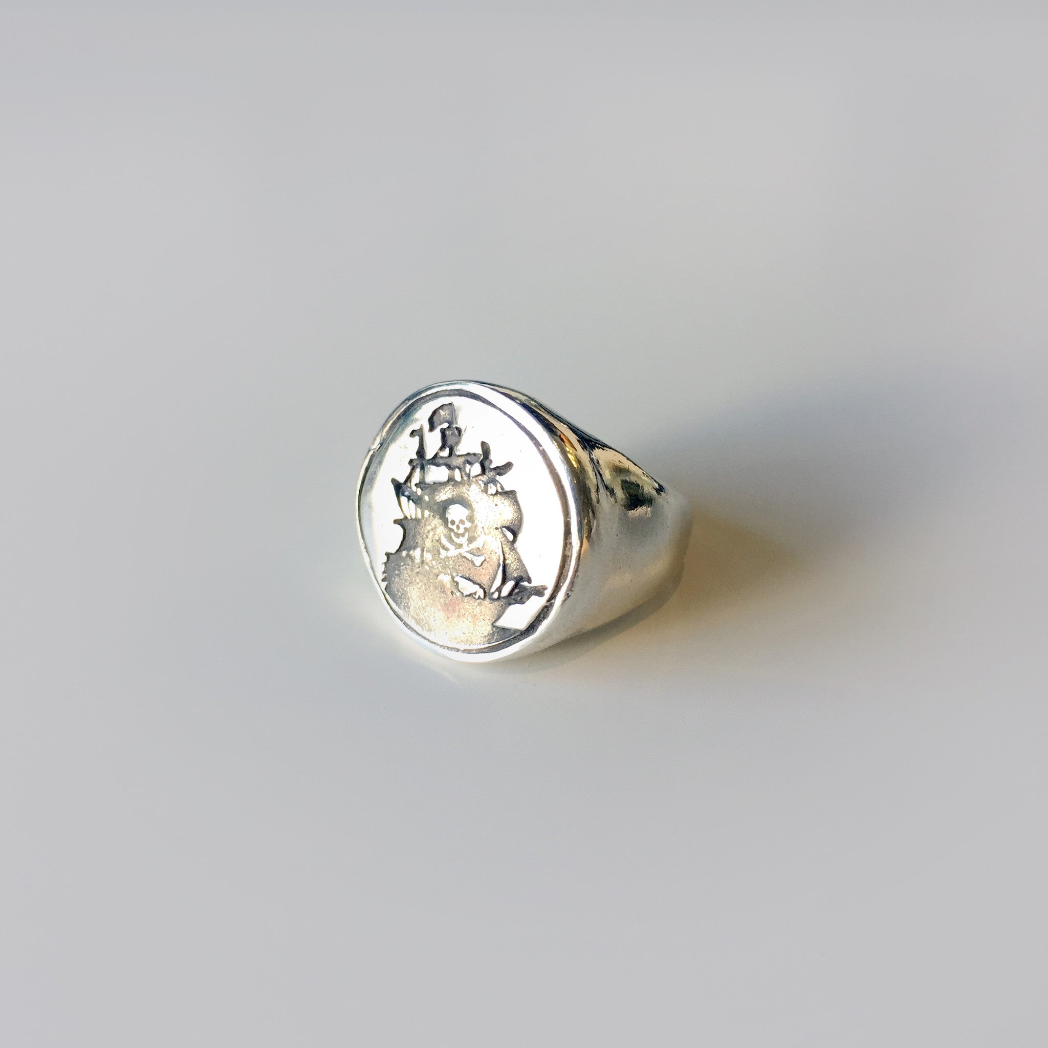 Windfall Jewellery Docent Russian Tattoo Signet Ring in solid sterling silver featuring engraved skull and symbol design — bold handcrafted statement jewellery for men and women