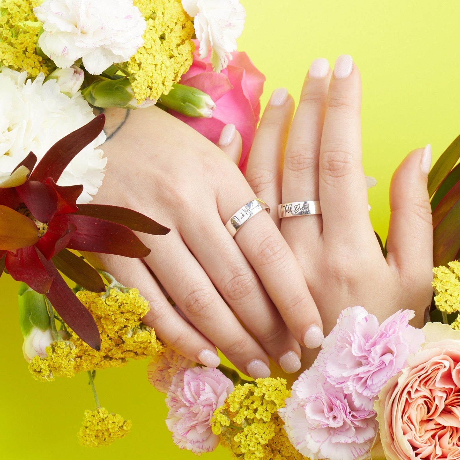 Till Death engraved band on flowers