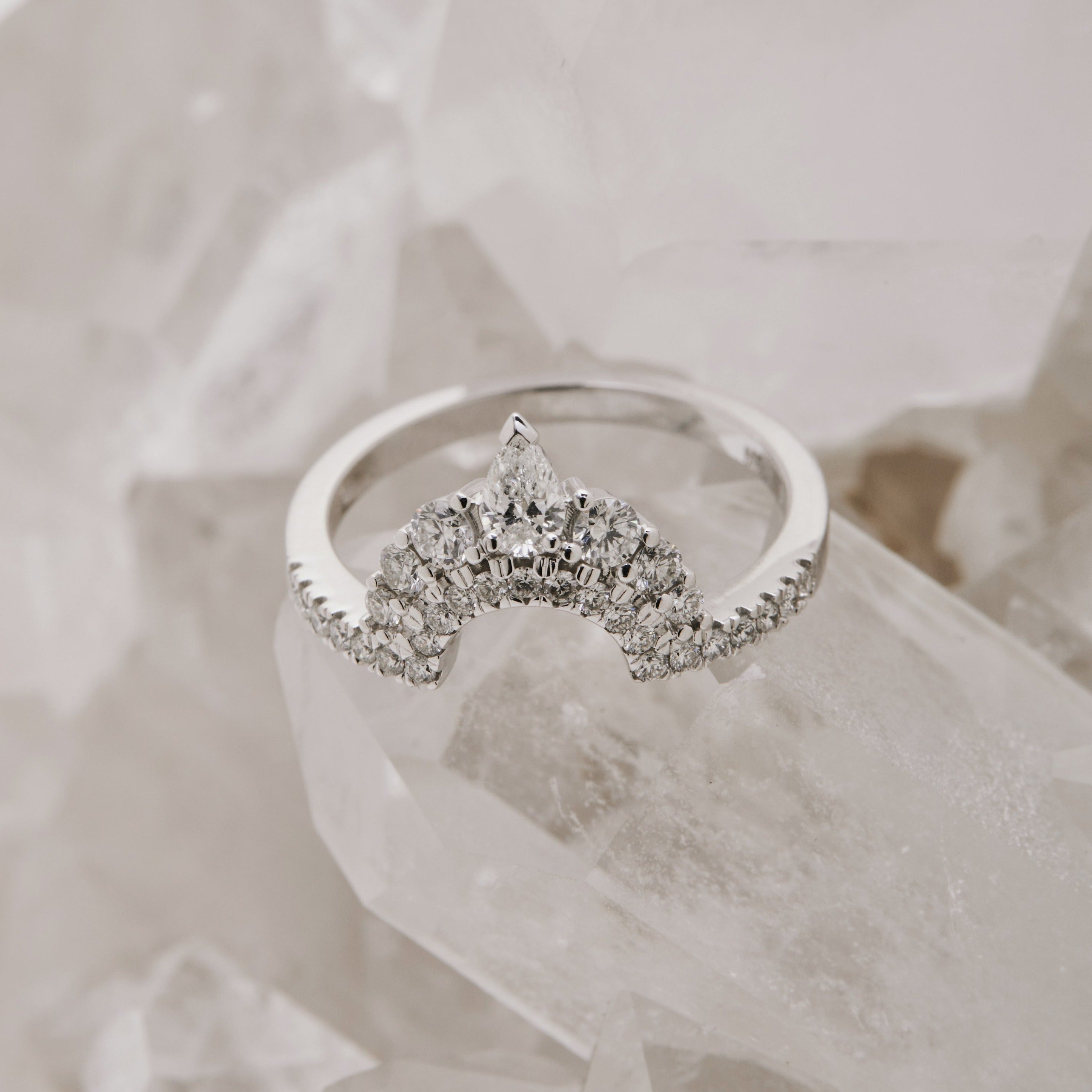 White Gold wedding band double row of white diamonds, with pear accent at tip