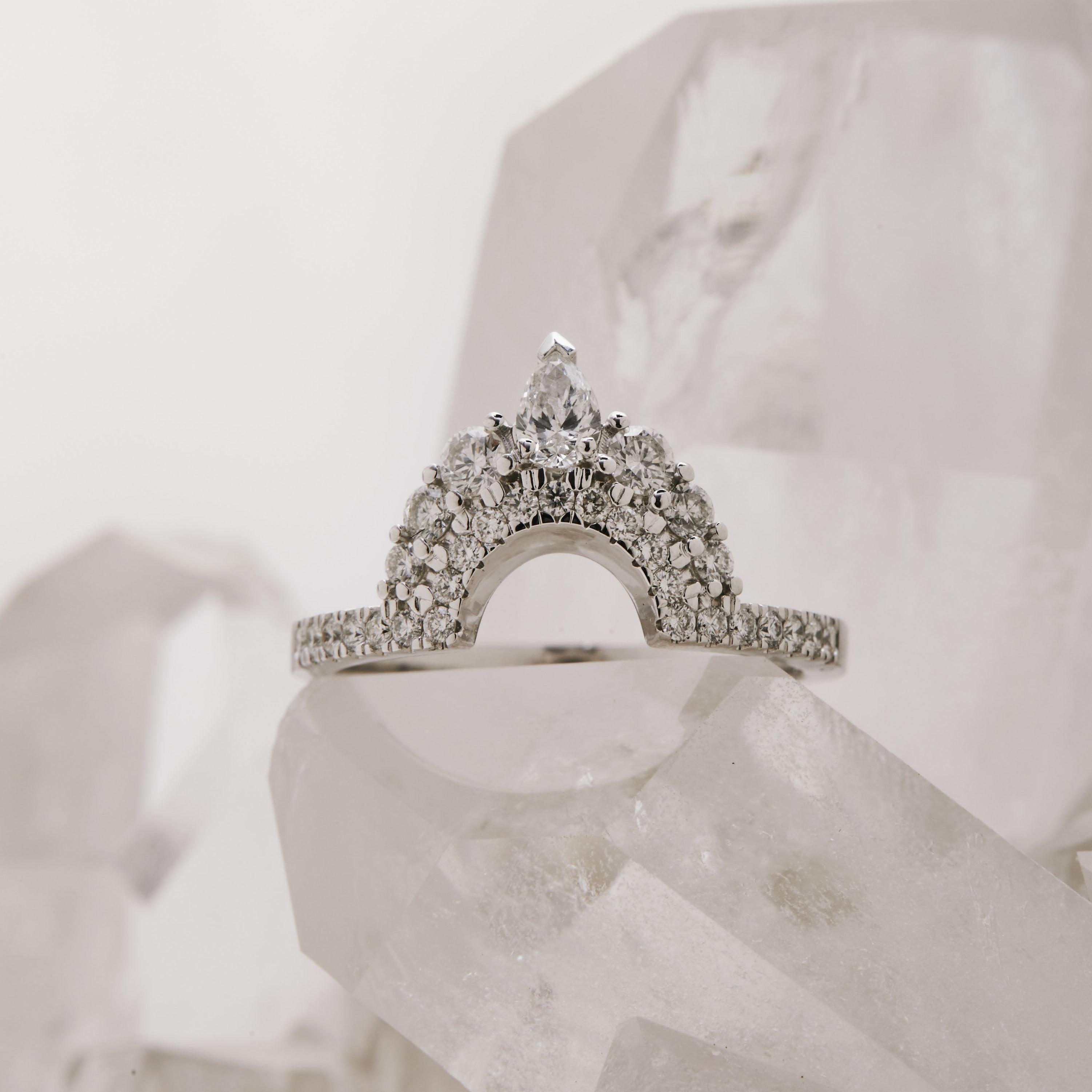 White Gold wedding band doubel row of white diamonds, with pear accent at tip