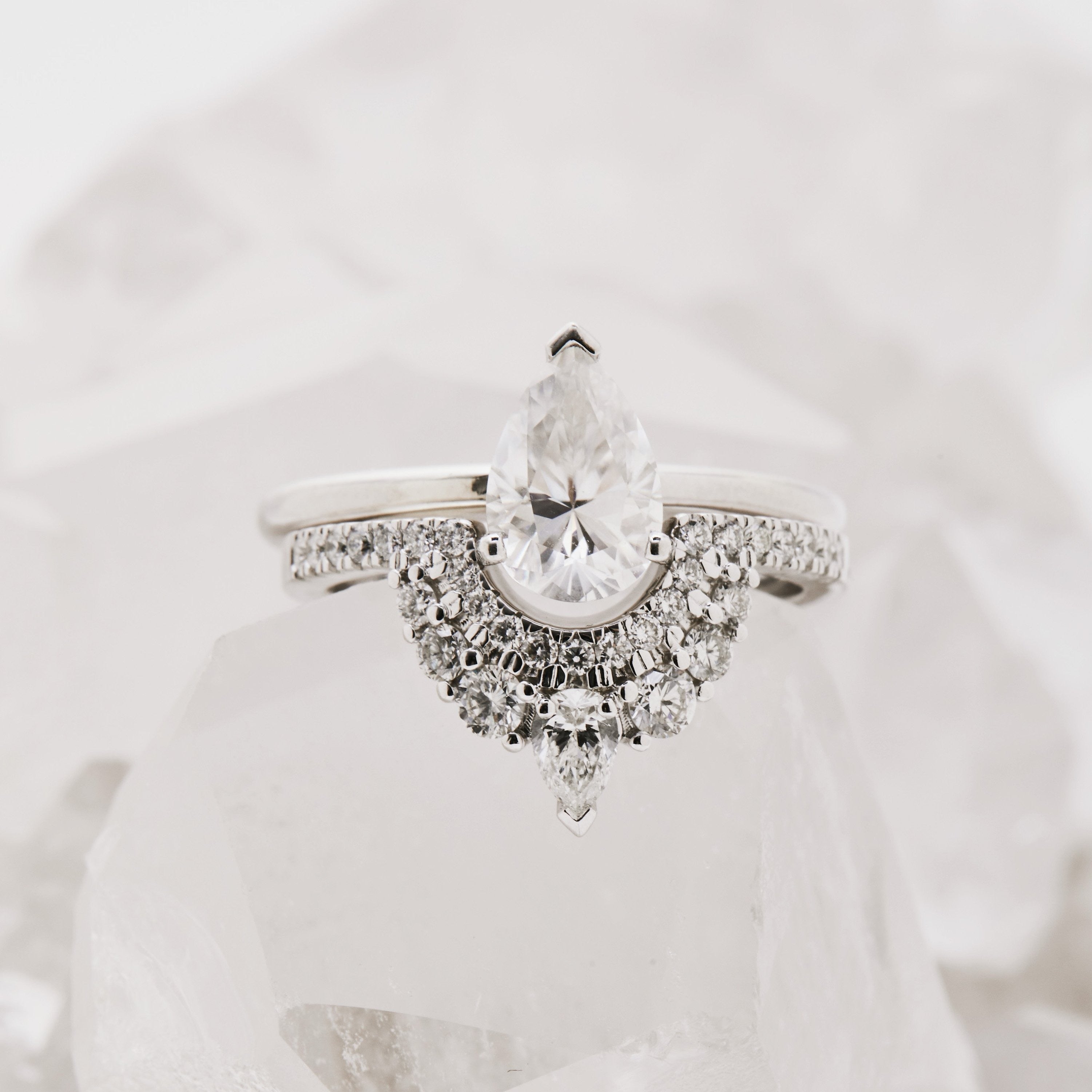 White Gold wedding band double ow of white diamonds, with pear accent at tip