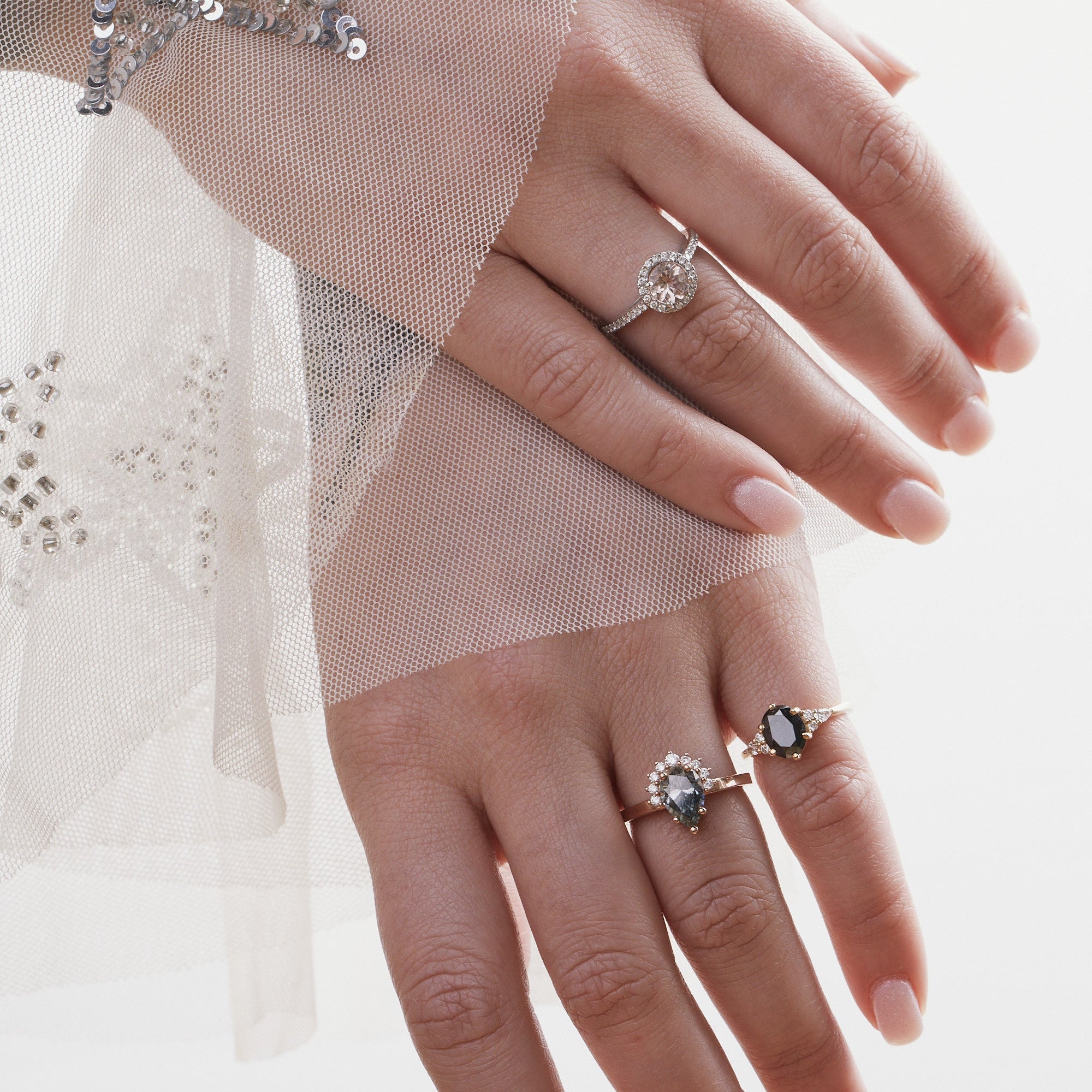 engagement ring pear sapphire with half halo