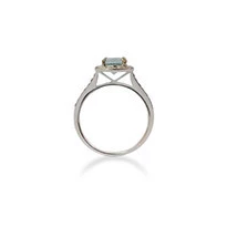 Elegant aquamarine engagement ring set in white gold with diamond halo