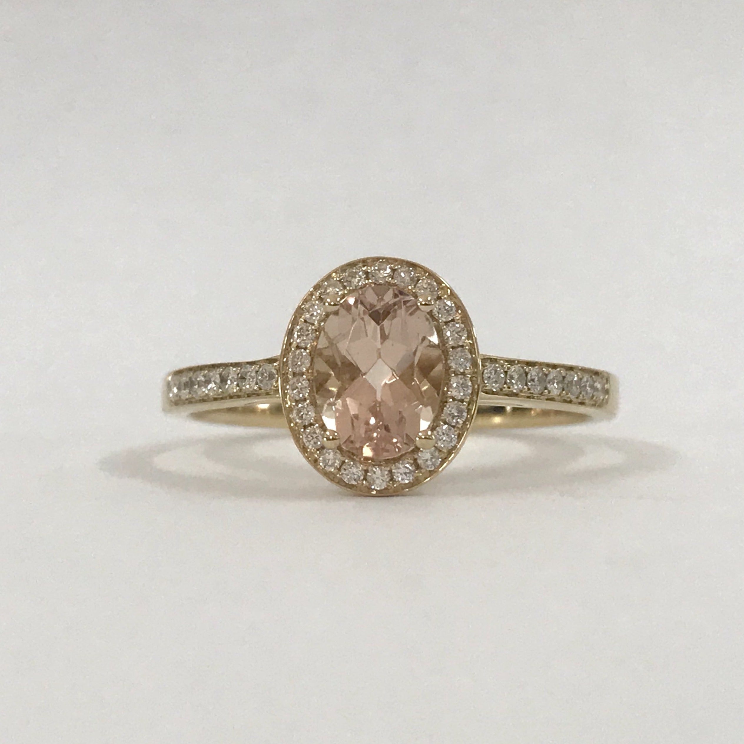 Windfall Jewellery oval halo engagement ring with morganite center stone and diamond halo set in white gold — elegant and timeless bridal jewellery.