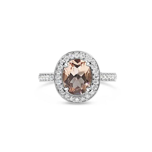 Windfall Jewellery oval halo engagement ring with morganite center stone and diamond halo set in white gold — elegant and timeless bridal jewellery.