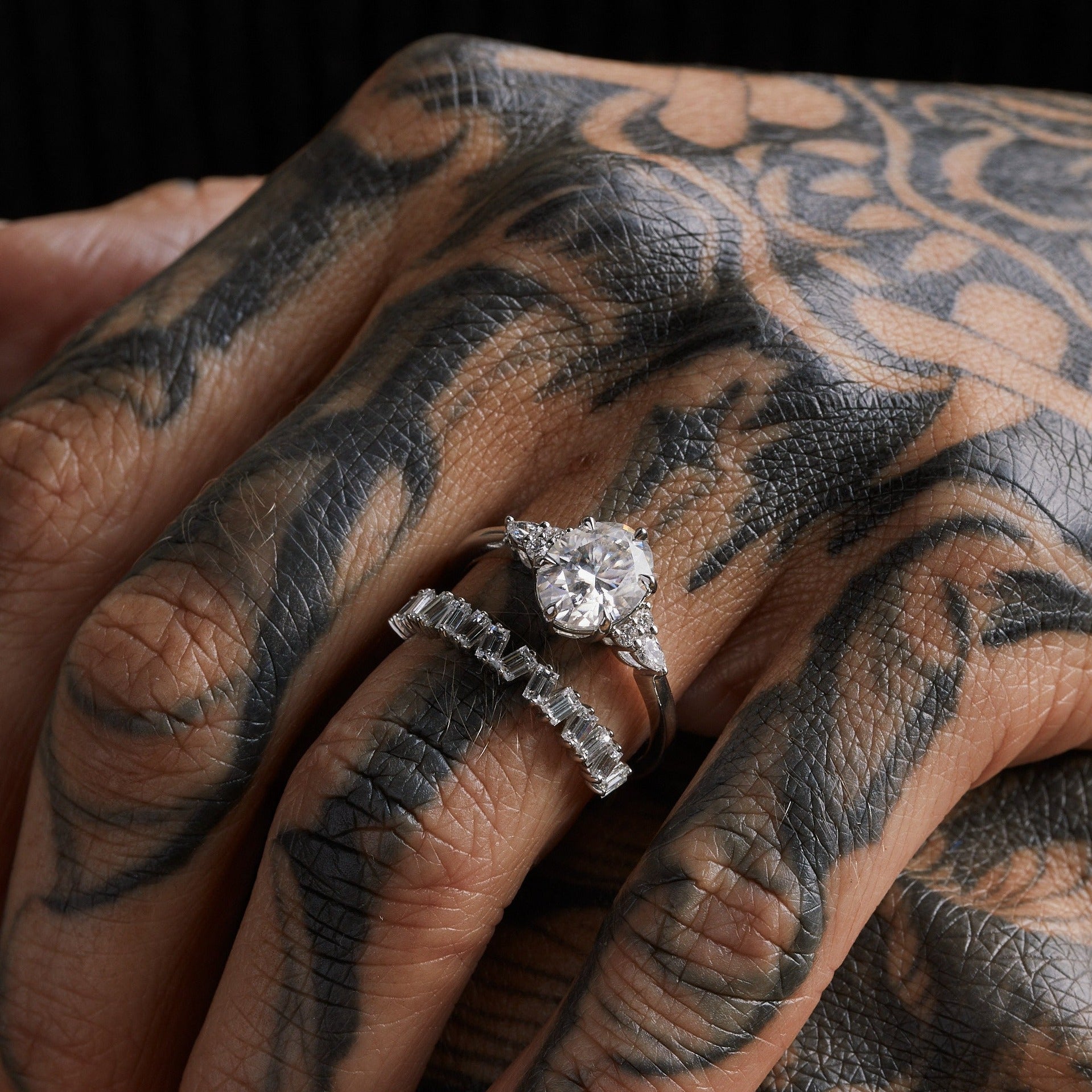 yoki oval lab diamond with pear accents on side white gold
