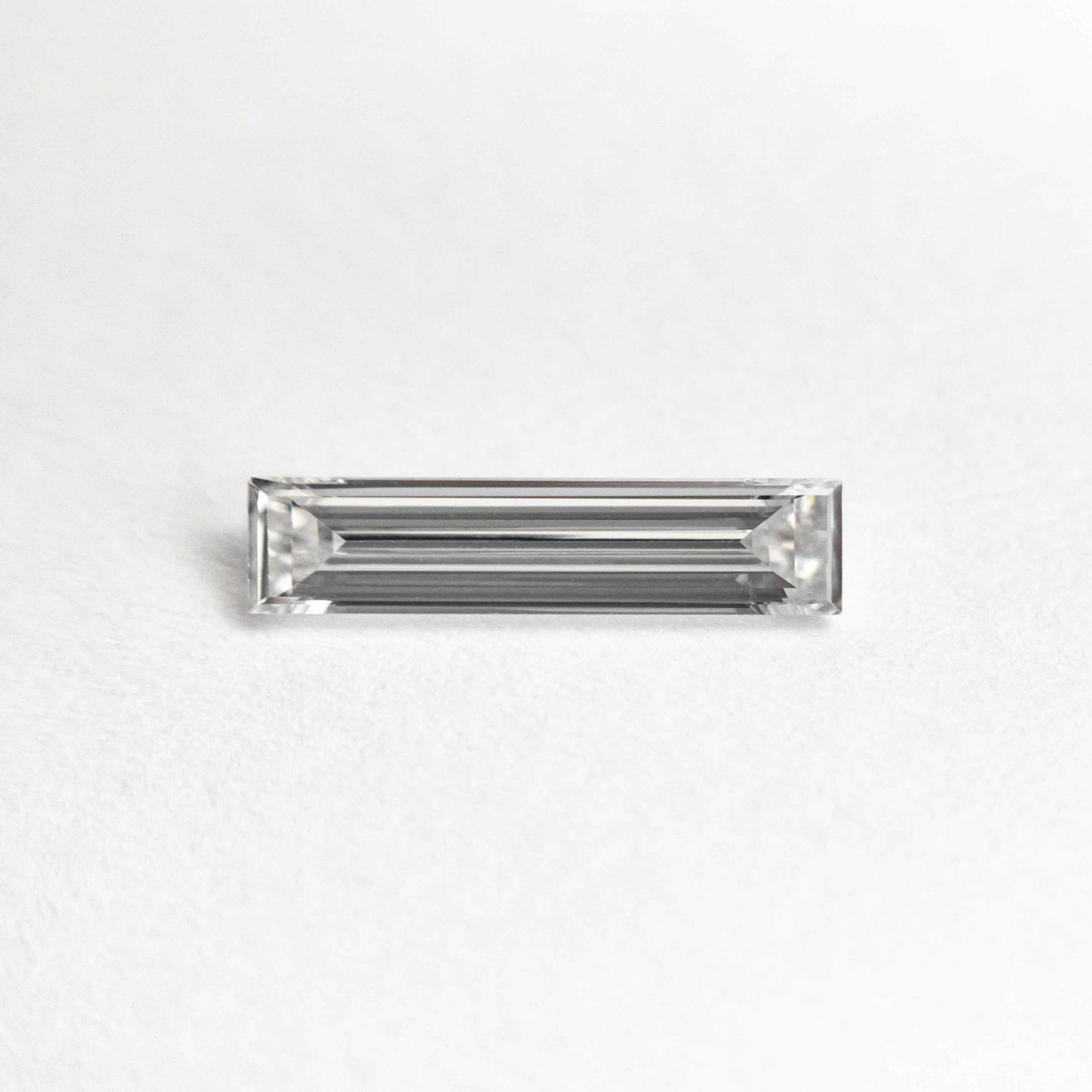 0.25ct 9.05x2.06x1.24mm VS1 E Baguette Step Cut 24701 07