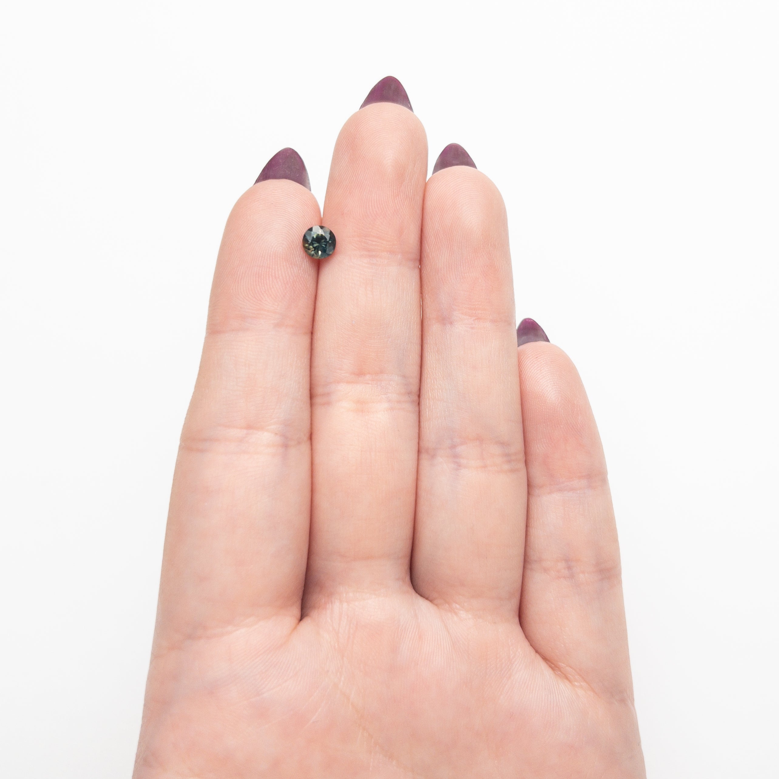 0.70ct 5.16x5.10x3.61mm Round Brilliant Sapphire 26526-08