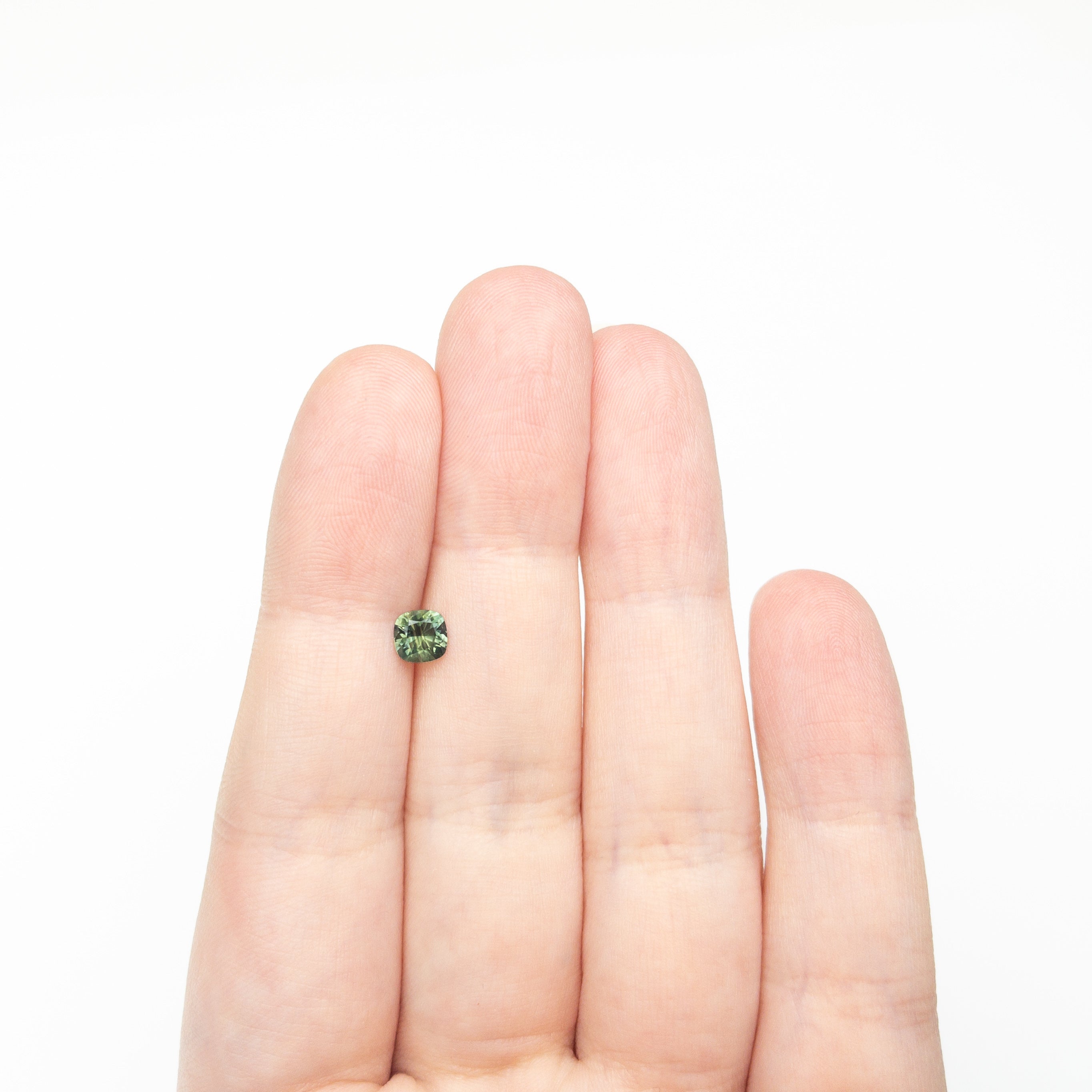 0.65ct 5.06x5.00x3.28mm Cushion Brilliant Sapphire 27336-15