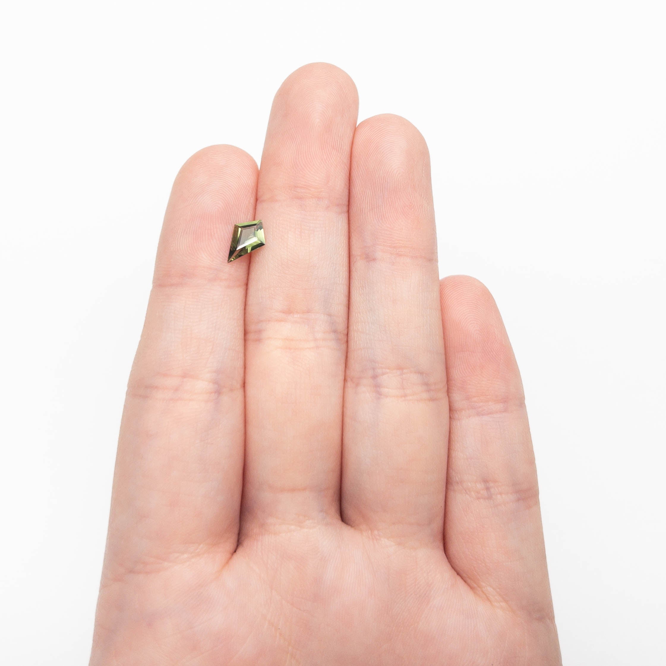 0.67ct 9.19x6.15x2.40mm Kite Step Cut Sapphire 27363-12