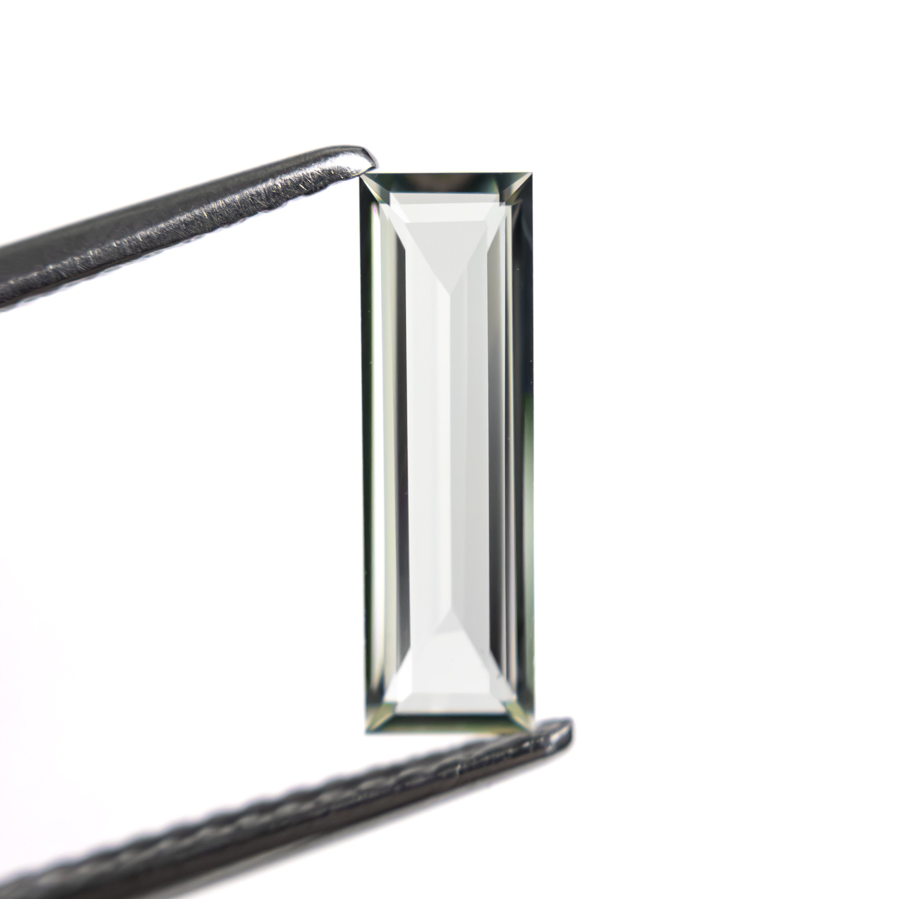 0.81ct 11.41x3.48x1.63mm Baguette Step Cut Sapphire 27720-05