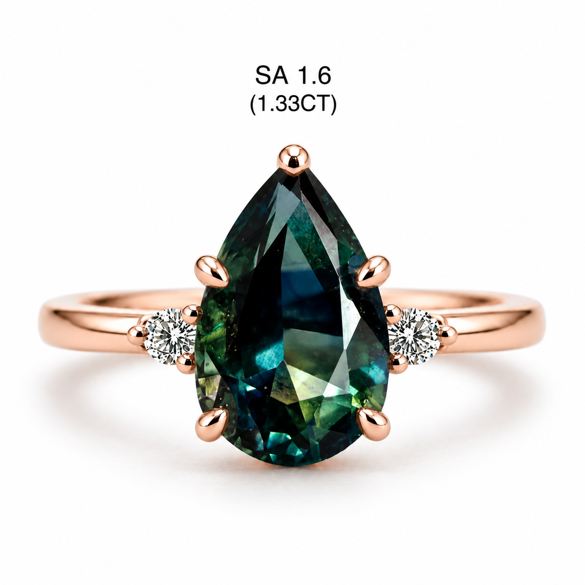 A pear-cut teal gemstone ring in a rose gold setting with two small round side stones, shown on a white background with text reading 'SA 1.6 (1.