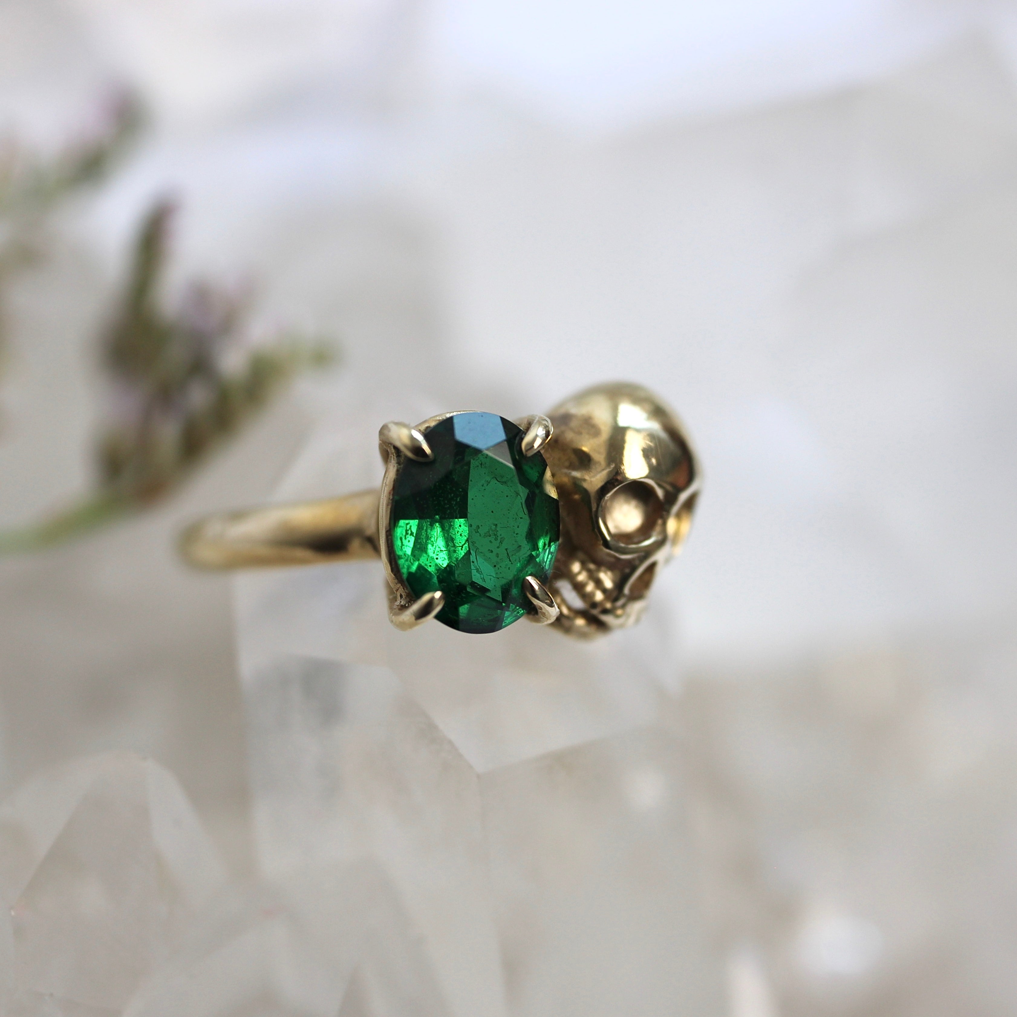 Windfall Jewellery The Bitter End skull ring with deep green  gemstone set in yellow gold — unique handcrafted gothic-inspired jewellery for men and women