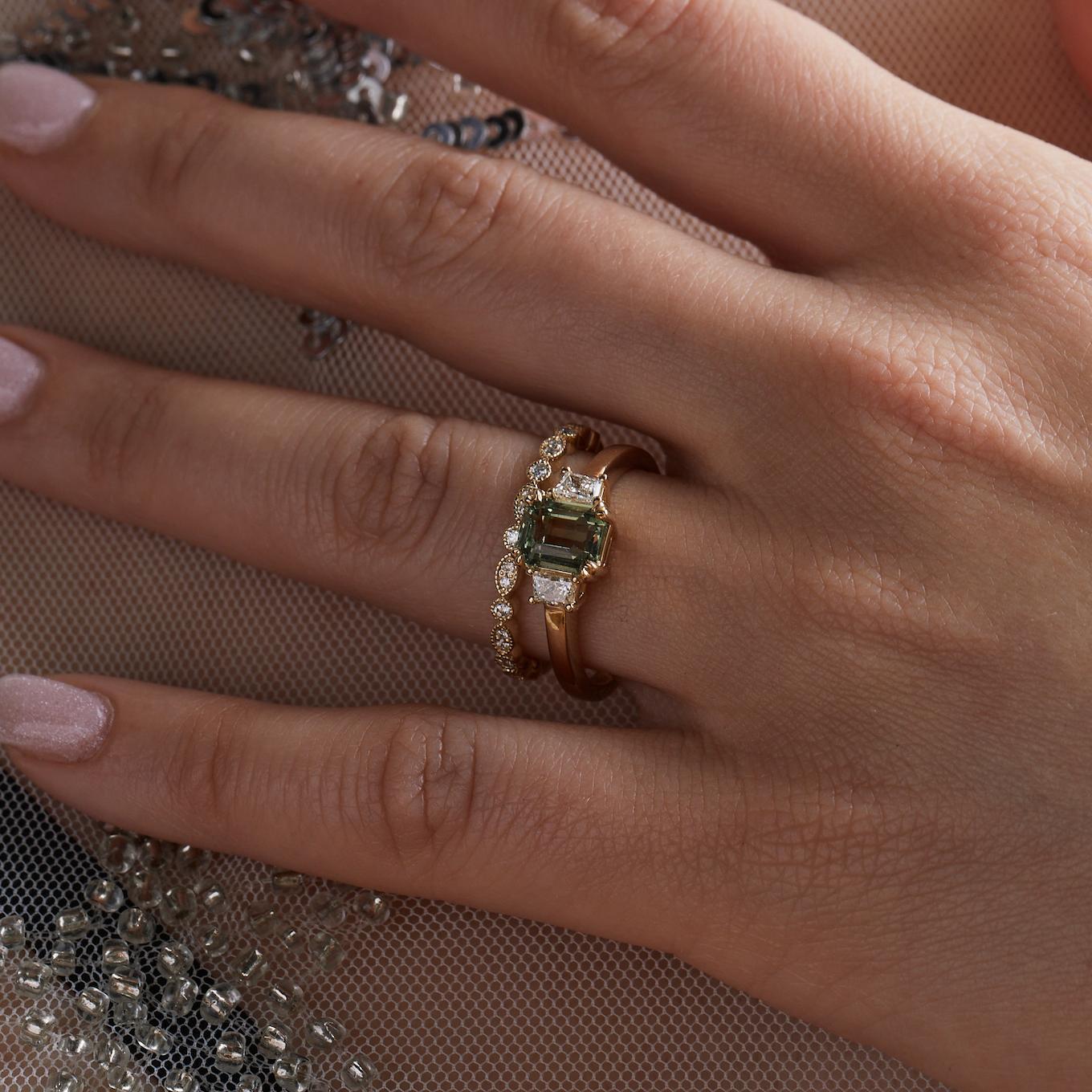 Art deco green sapphire with baguette diamond accents