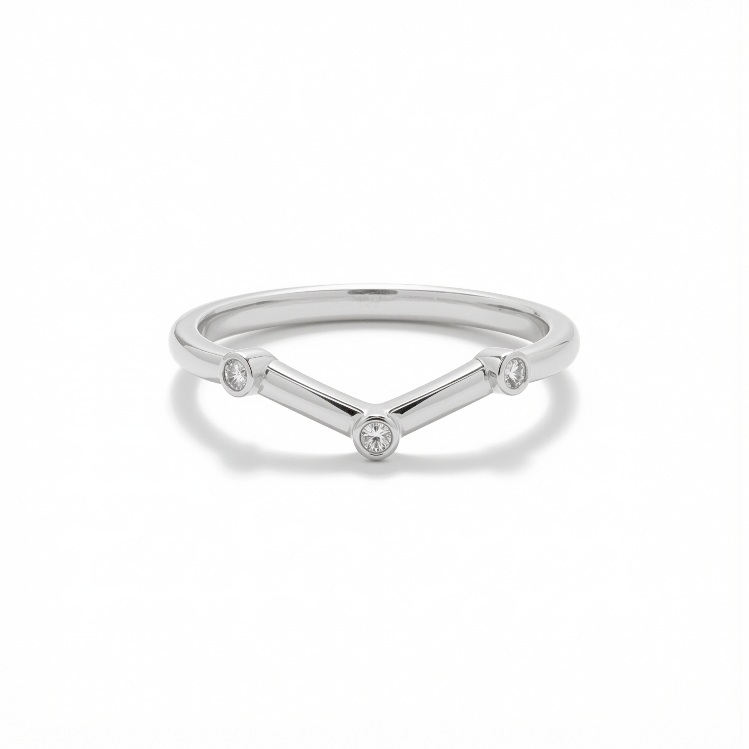 white gold ring in a pointed chevron shape with small diamonds on a white background