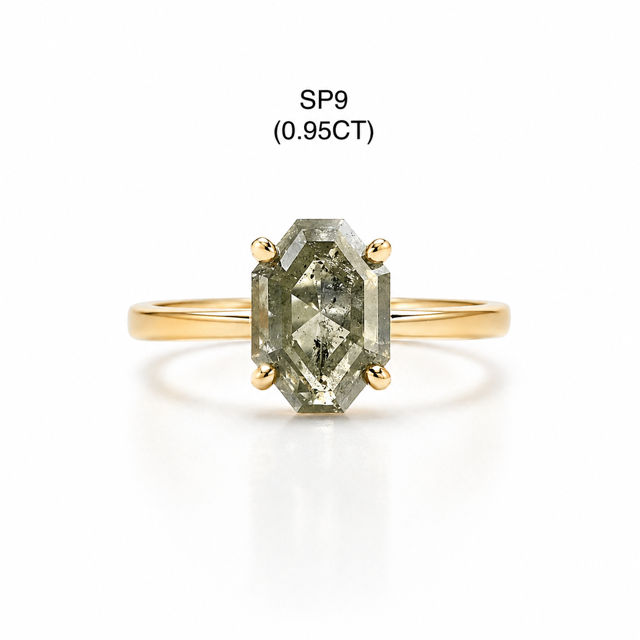 Gold ring with a geometrical diamond on a white background