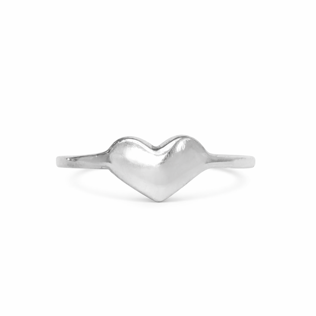 heart shaped dainty ring on white background