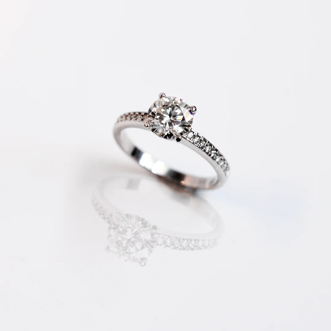 lab created diamondwhite gold solitaire with white diamonds on the shoulders