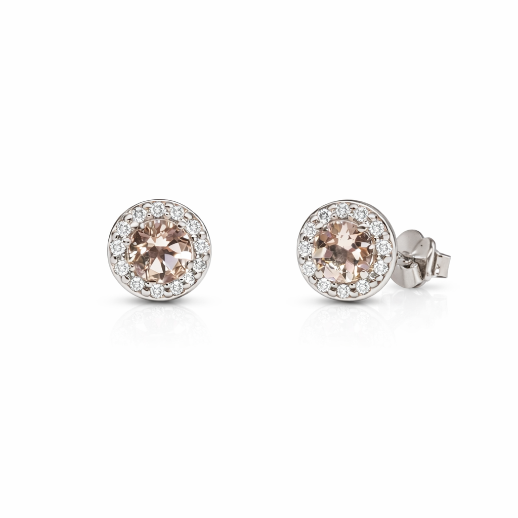 Pair of white gold stud earrings with pink morganite gemstones on a white background