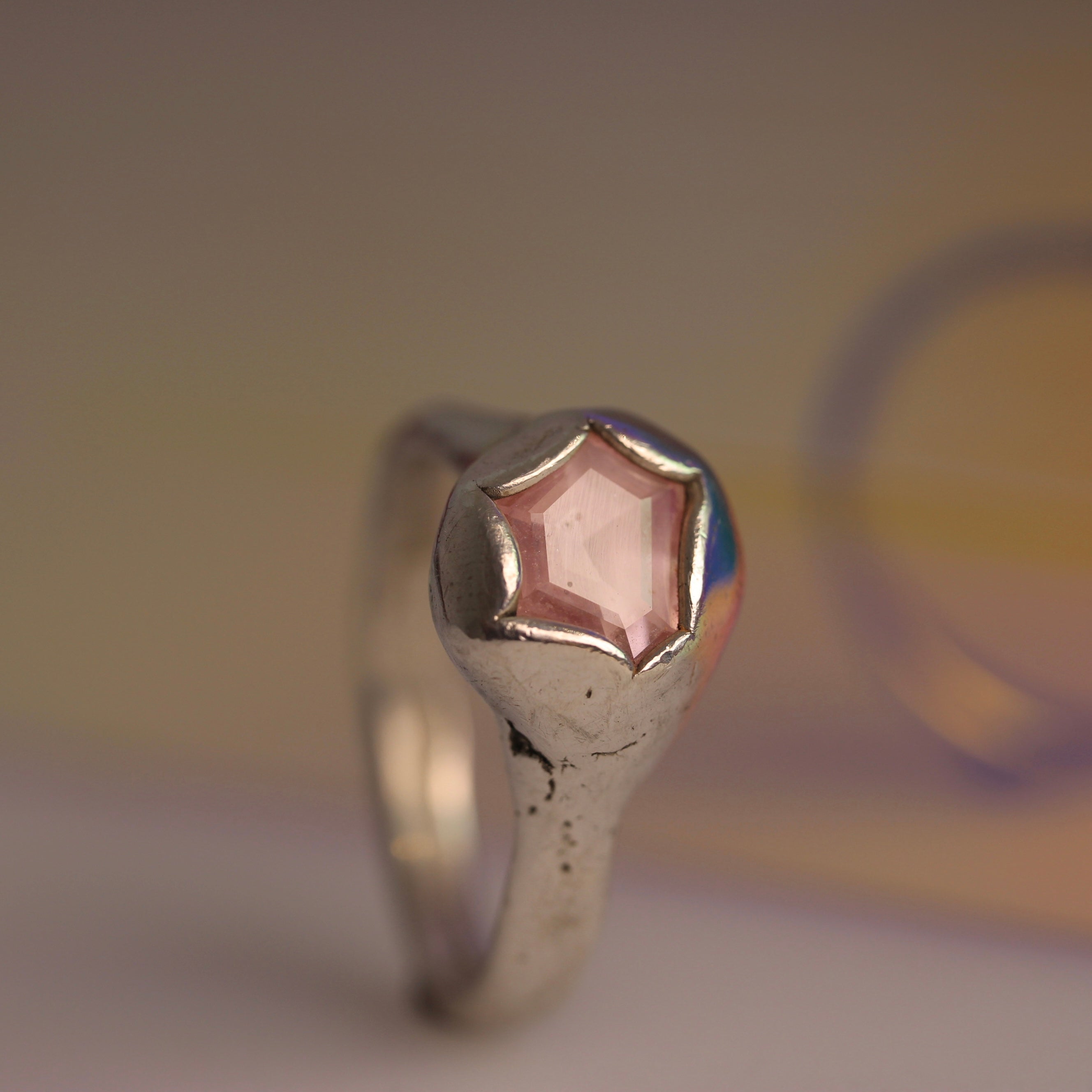 organic blob style ring with pink geometrical sapphire