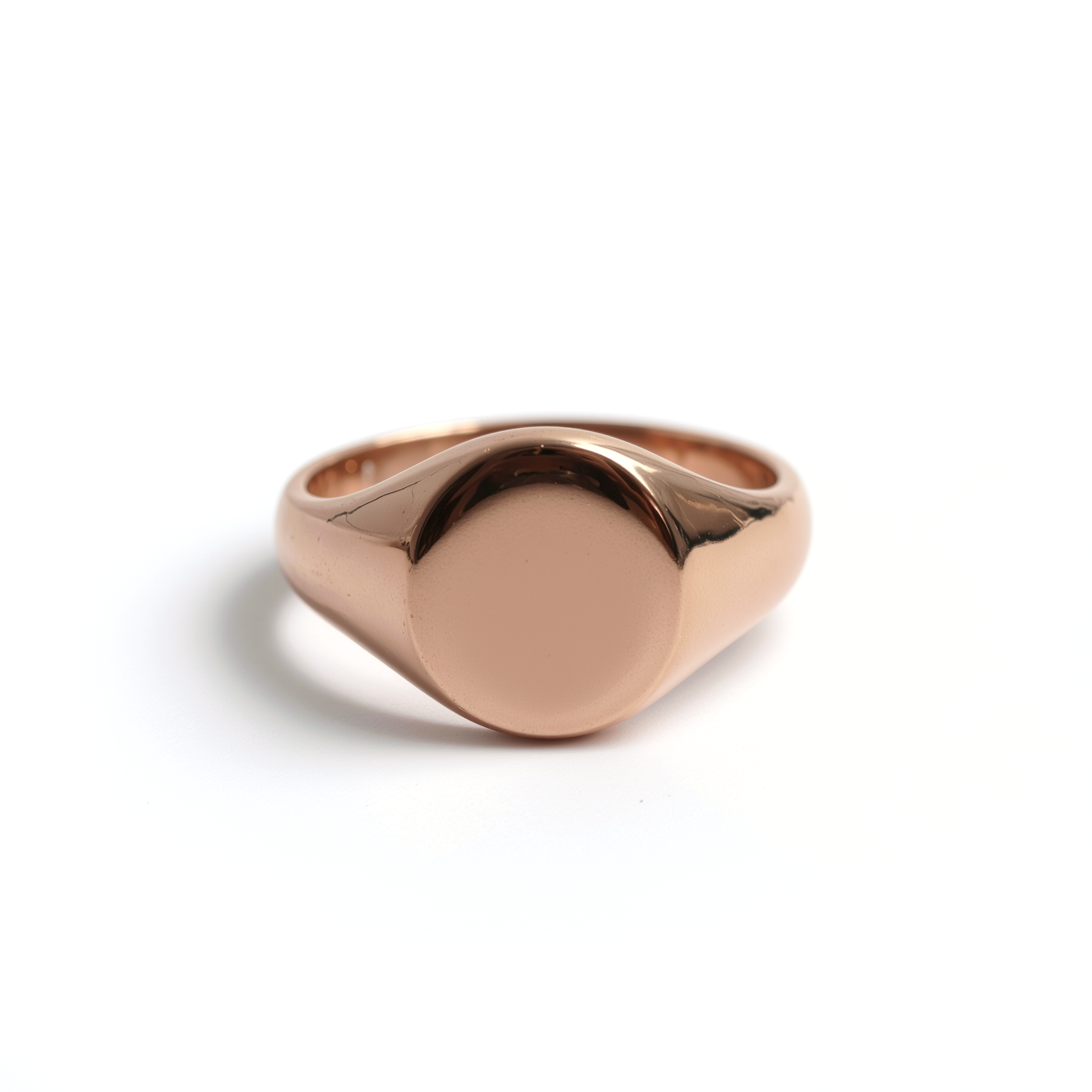 Rose gold ring on a white background