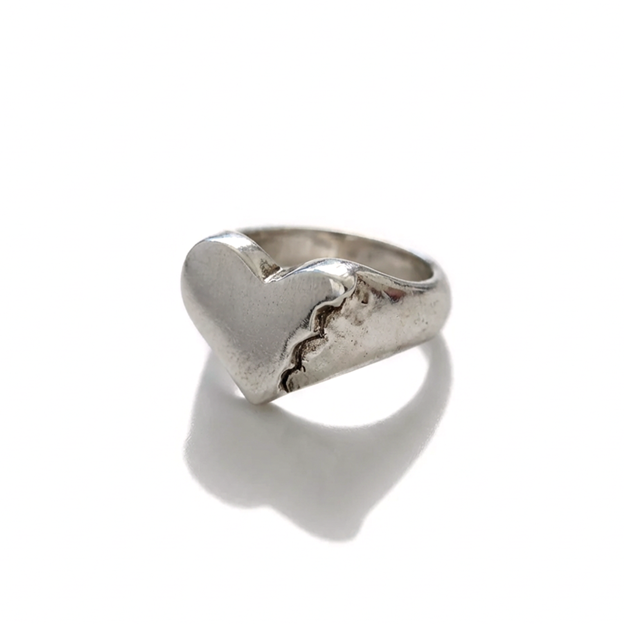 Silver ring on a white background