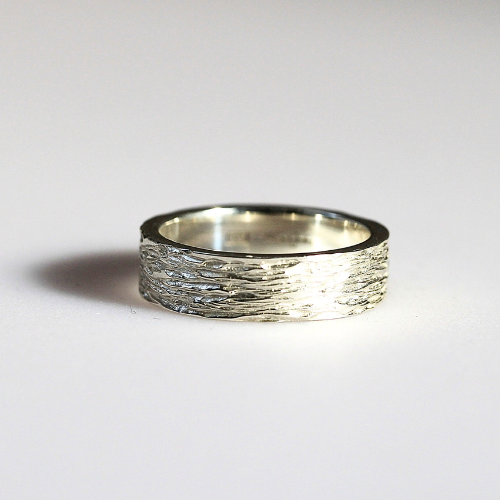 silver mens wedidng ring iwth textured design