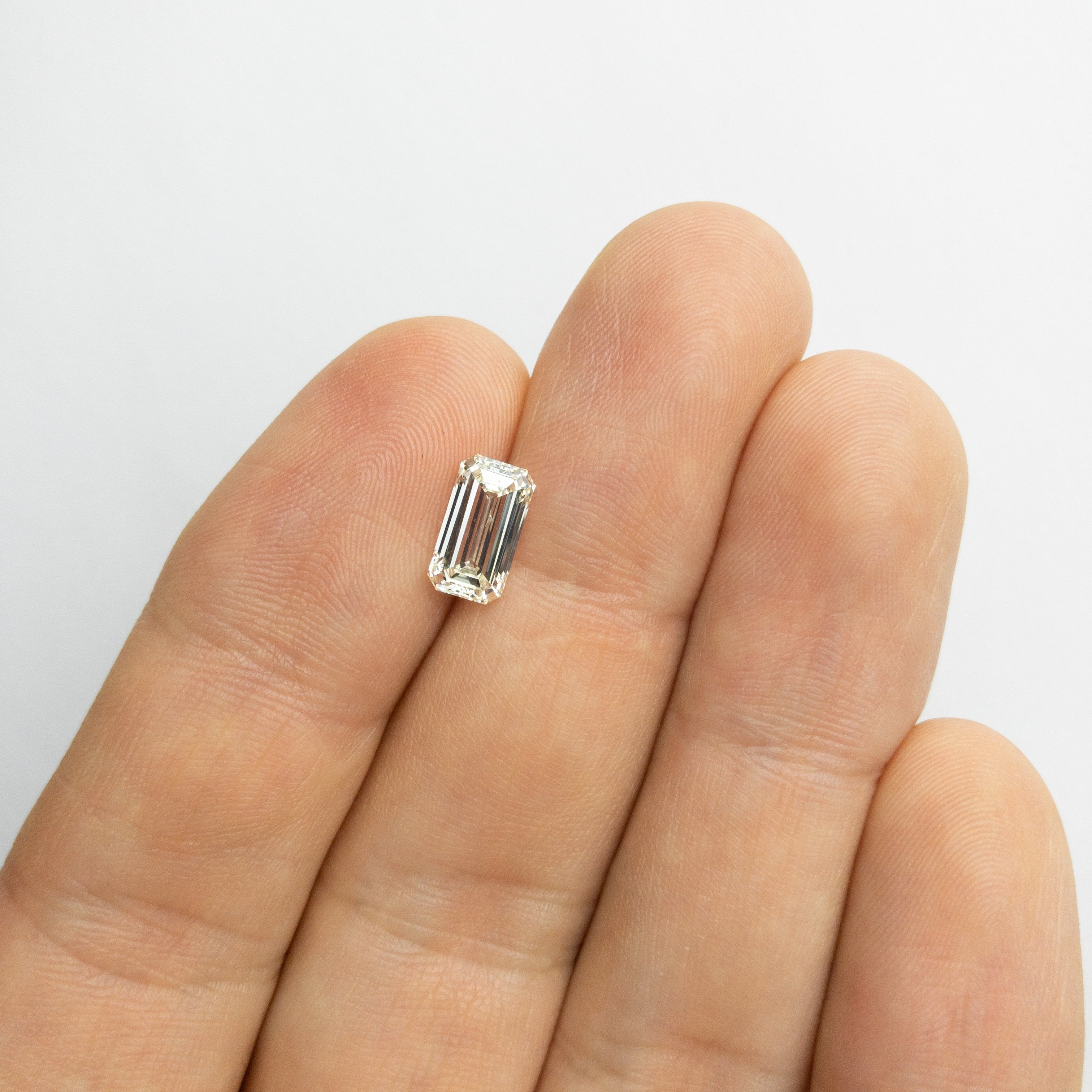 1.64ct 9.30x5.09x3.32mm SI1 Light Yellow Emerald Cut 18071-01 HOLD 6/10/20 D757