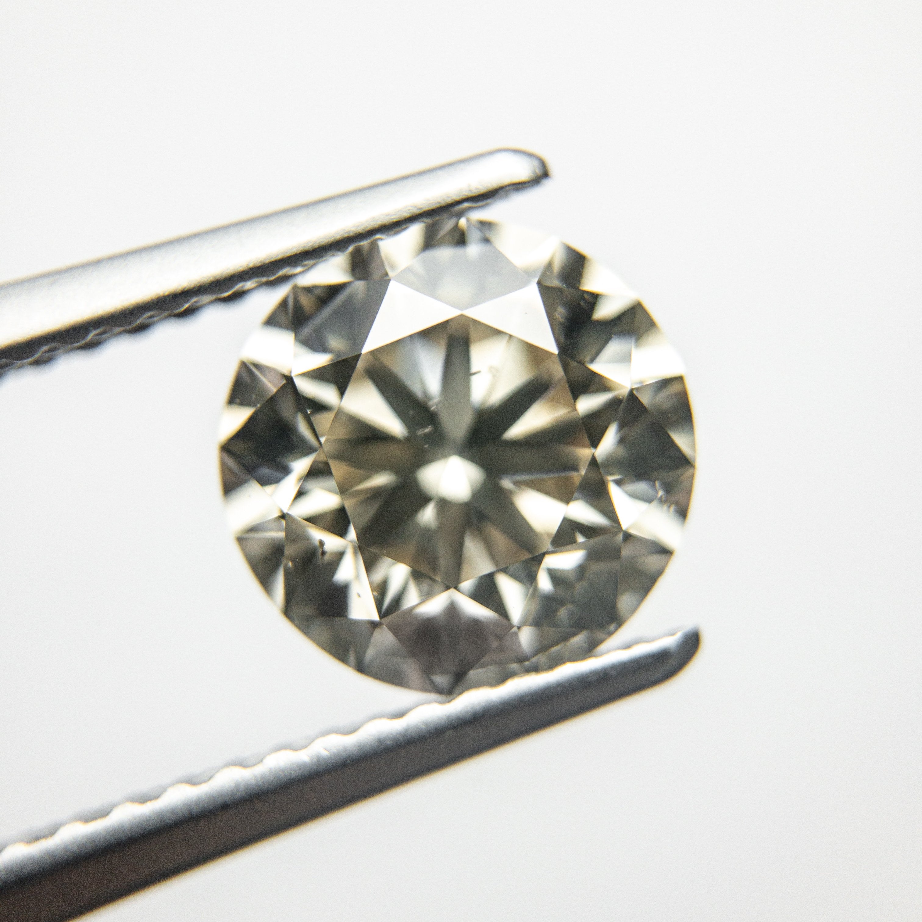 2.40ct 8.37x8.28x5.40mm GIA SI1 Light Champagne Round Brilliant 18098-01