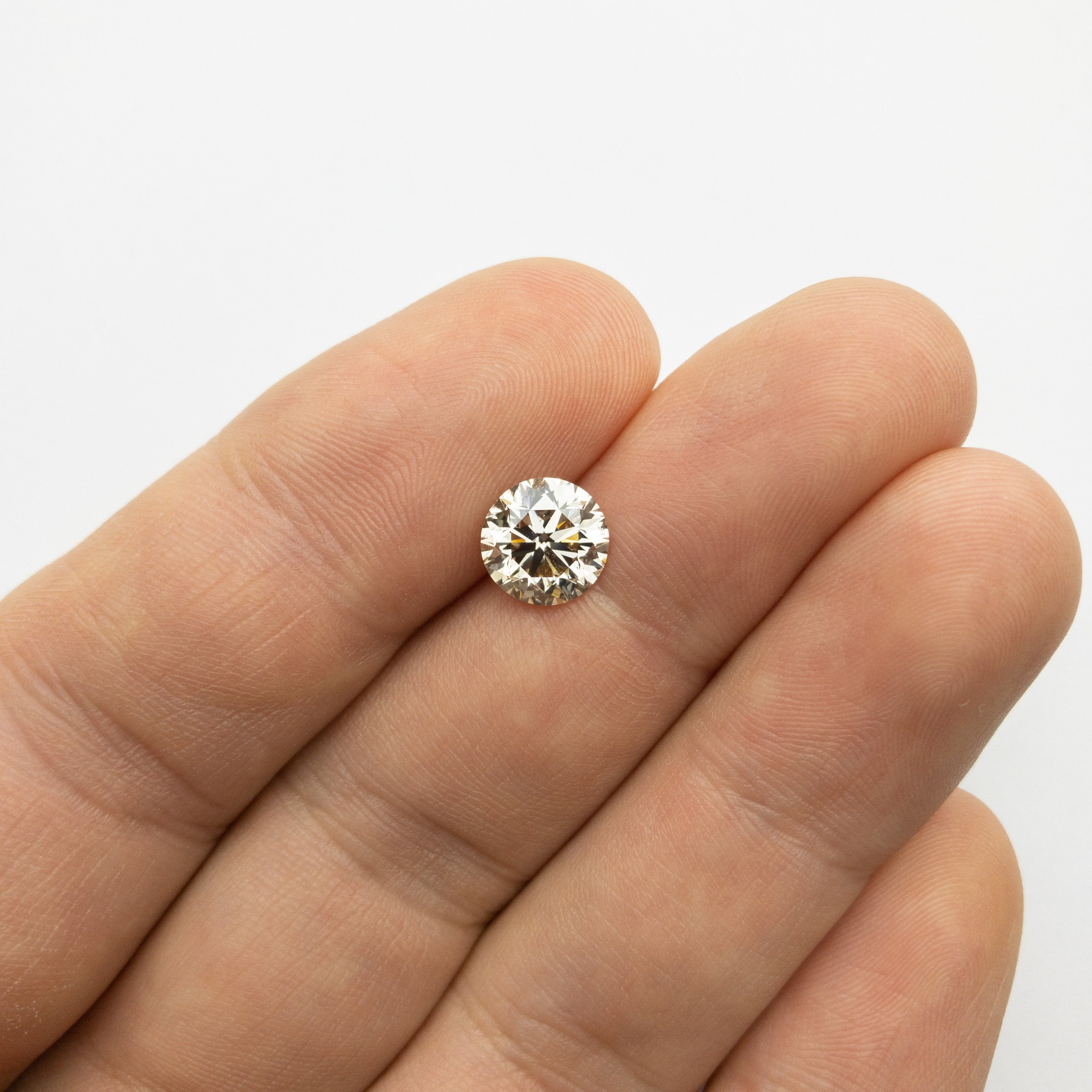 2.40ct 8.37x8.28x5.40mm GIA SI1 Light Champagne Round Brilliant 18098-01