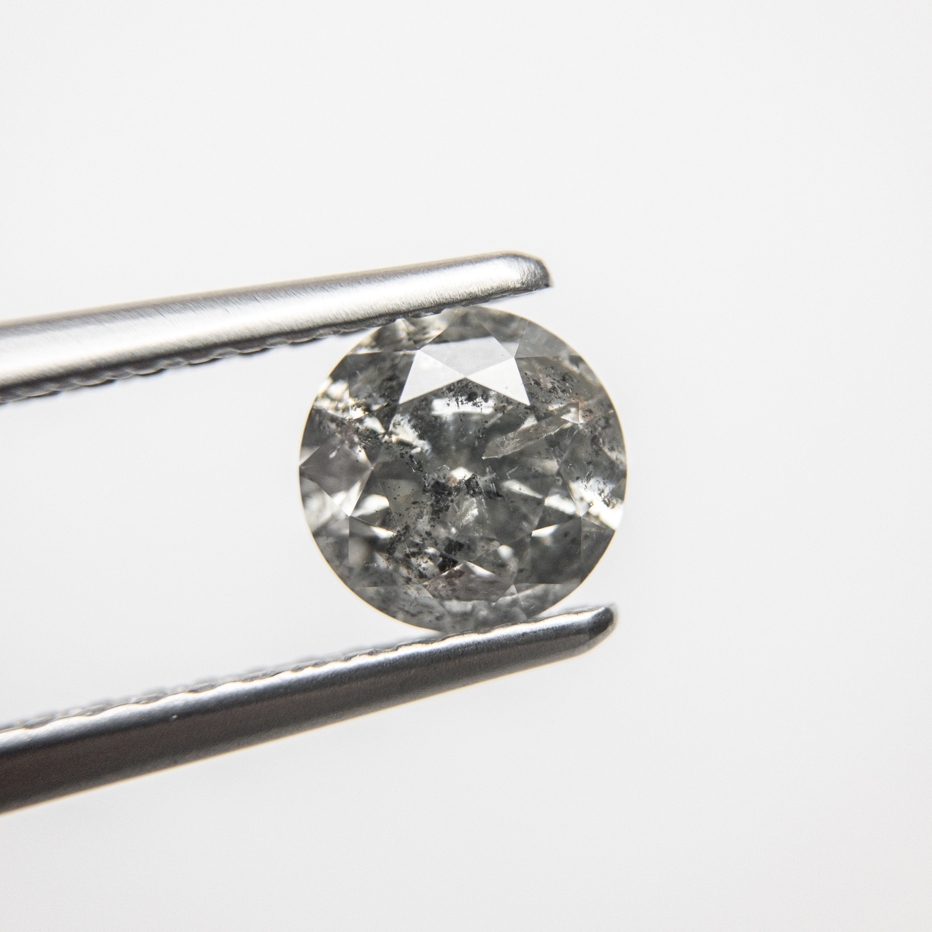 0.75ct 5.69x5.67x3.66mm Round Brilliant 18174-02 hold D1606