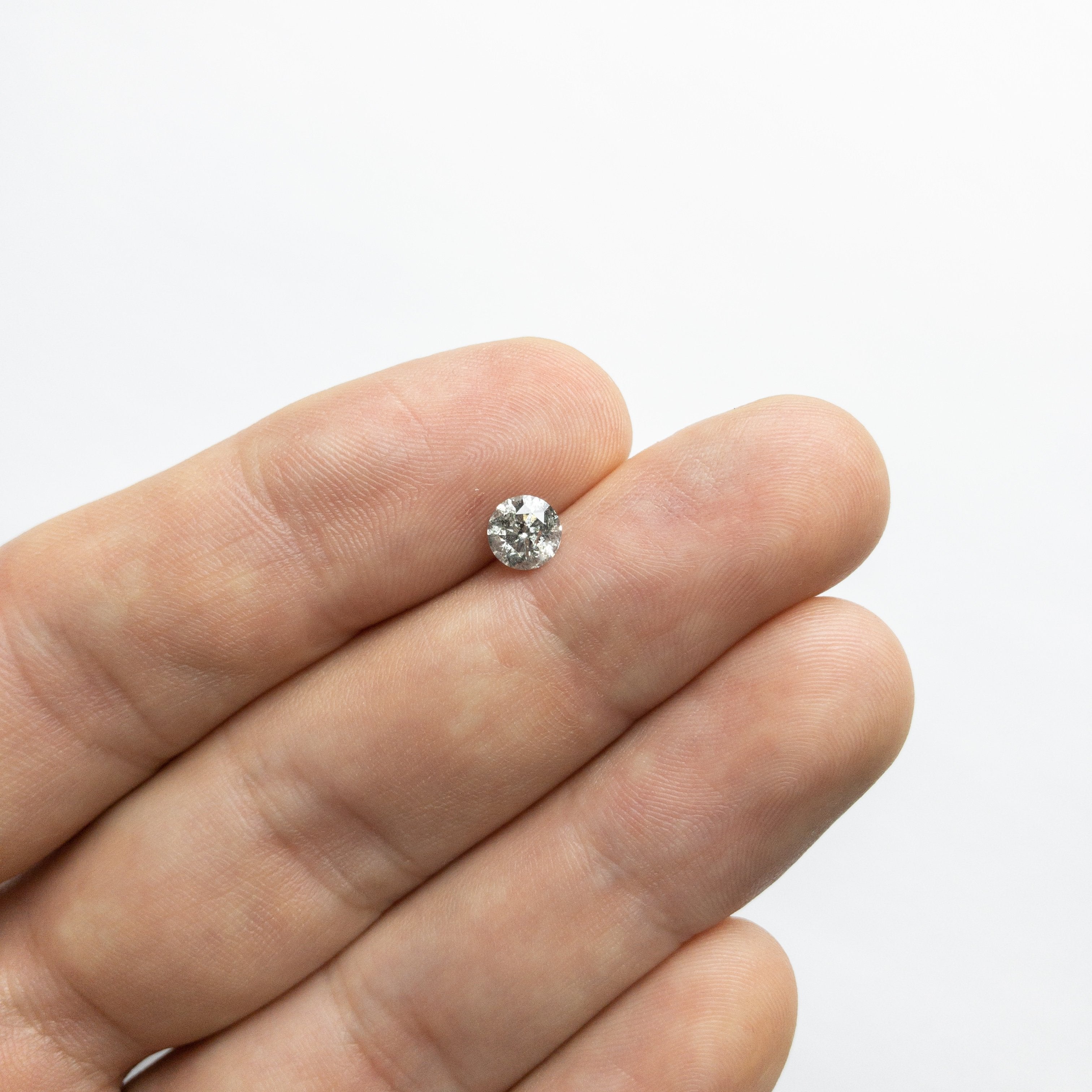 0.75ct 5.69x5.67x3.66mm Round Brilliant 18174-02 hold D1606