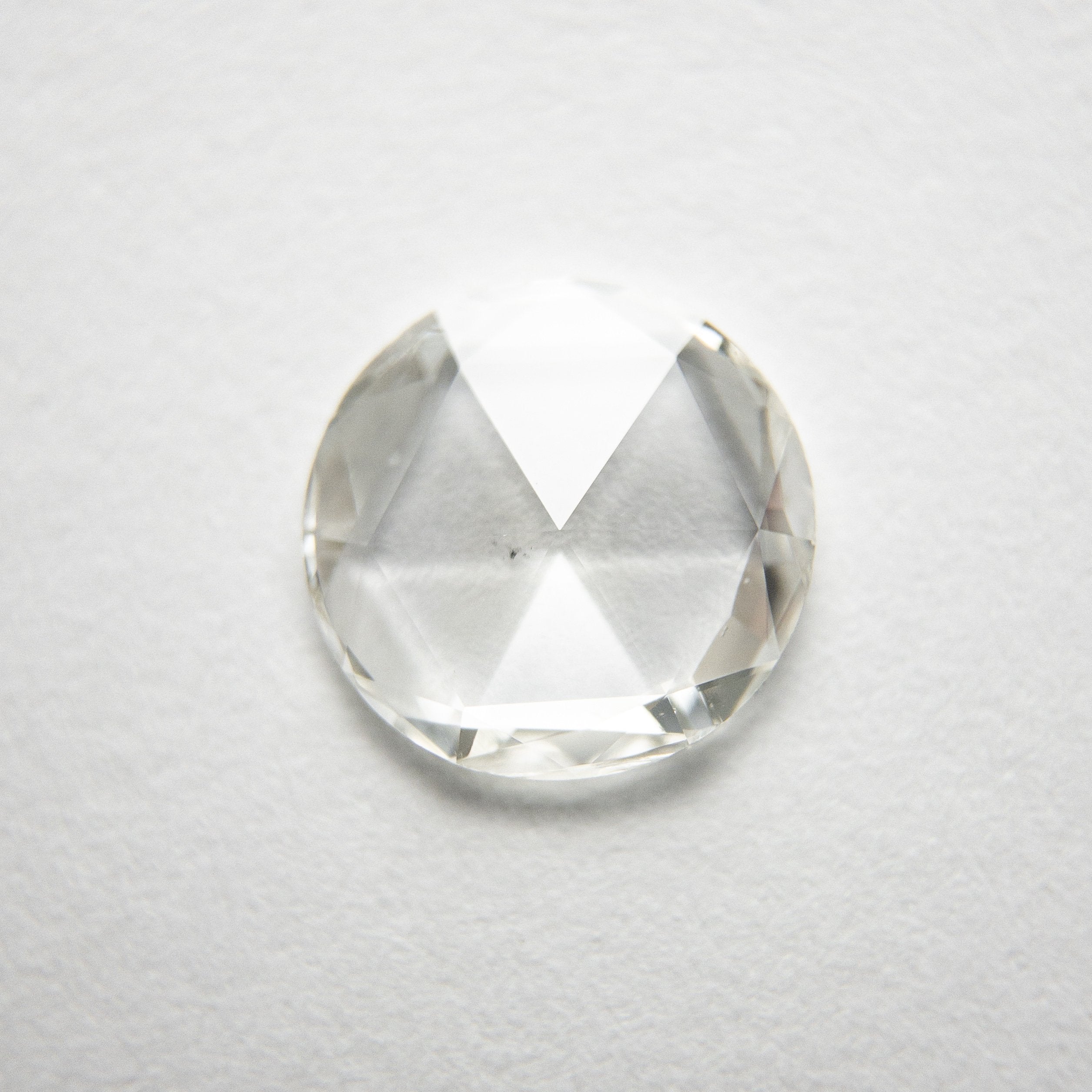 0.66ct 7.25x7.13x1.37mm SI1 H/I Round Rosecut 18284-01 Hold D1955