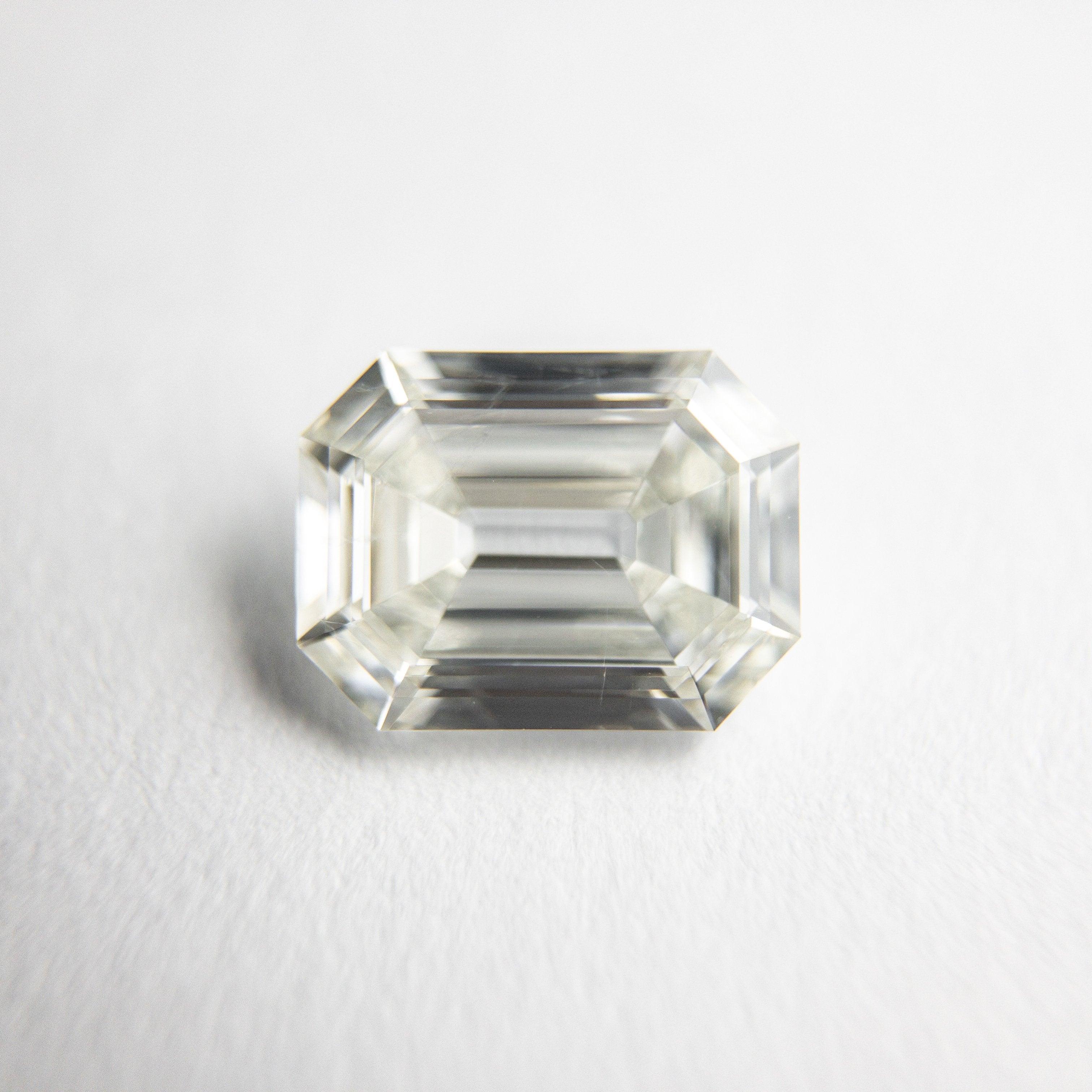 1.08ct 7.43x5.68x2.65mm SI1 J Cut Corner Rectangle Step Cut 18334-01 hold d1489